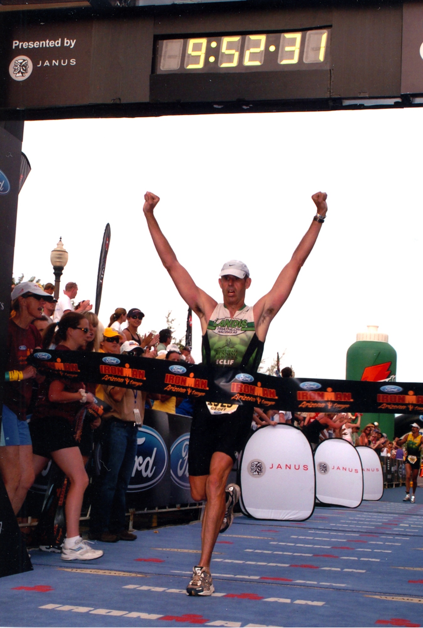 Lt. Col. Geoff Cleveland, 301st Fighter Squadron, crosses the finish line at the 2006 Ironman Triathlon in Tempe Town Center April 9. (Courtesy photo)