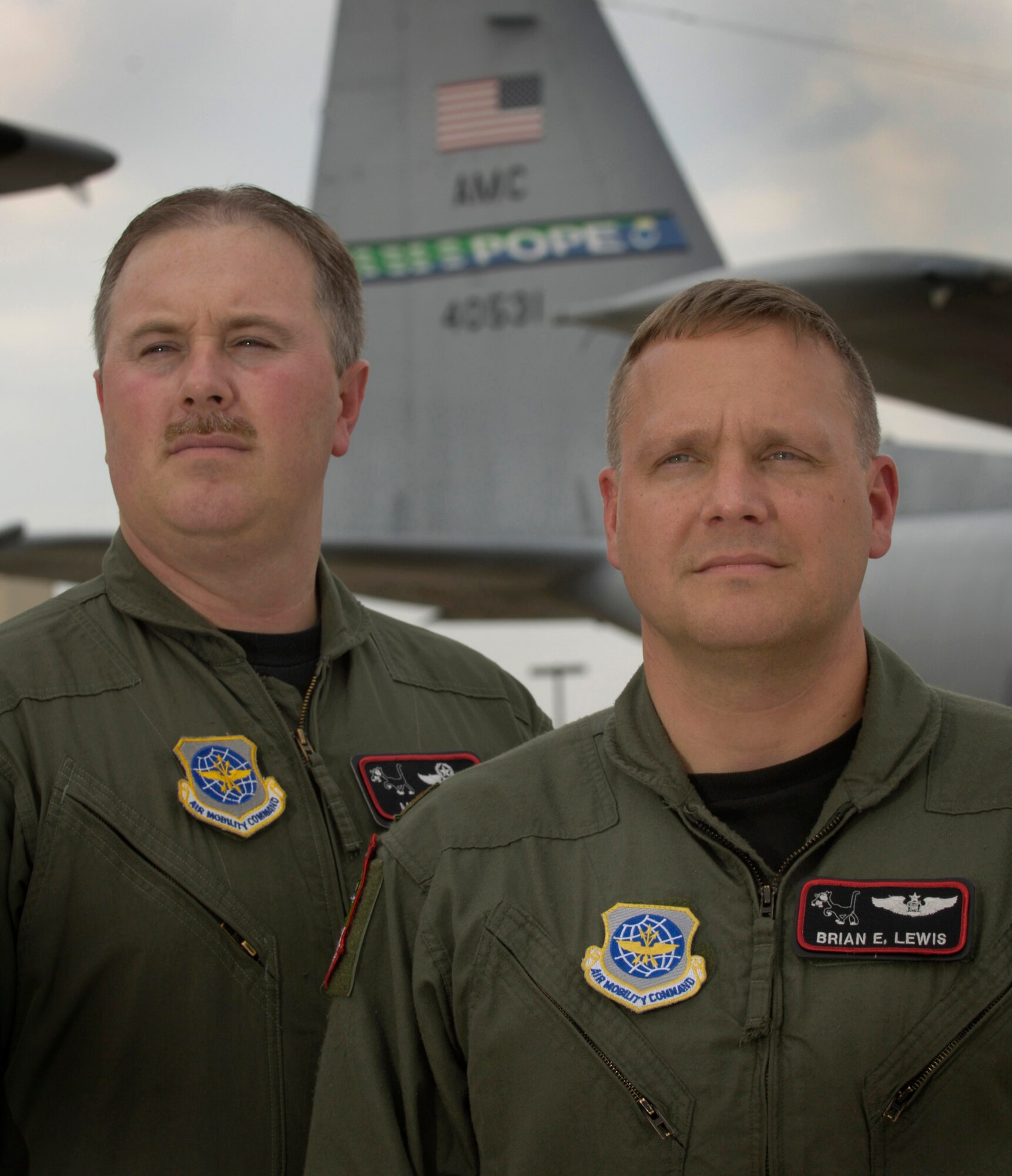 Majs. Michael Frame and Brian Lewis are two members of the aircrew that received the Clarence Mackay Trophy, an annual award given for the most meritorious flight of the year by an Air Force person, persons or organization. In addition to the majors, who are stationed at Pope Air Force Base, N.C., the other crew members are Senior Master Sgt. John Spillane, Little Rock AFB, Ark.; Master Sgt. Thomas Lee, Ramstein Air Base, Germany; and Tech. Sgt. Corey Turner, Dyess AFB, Texas. (U.S. Air Force photo/Master Sgt. Scott Wagers)