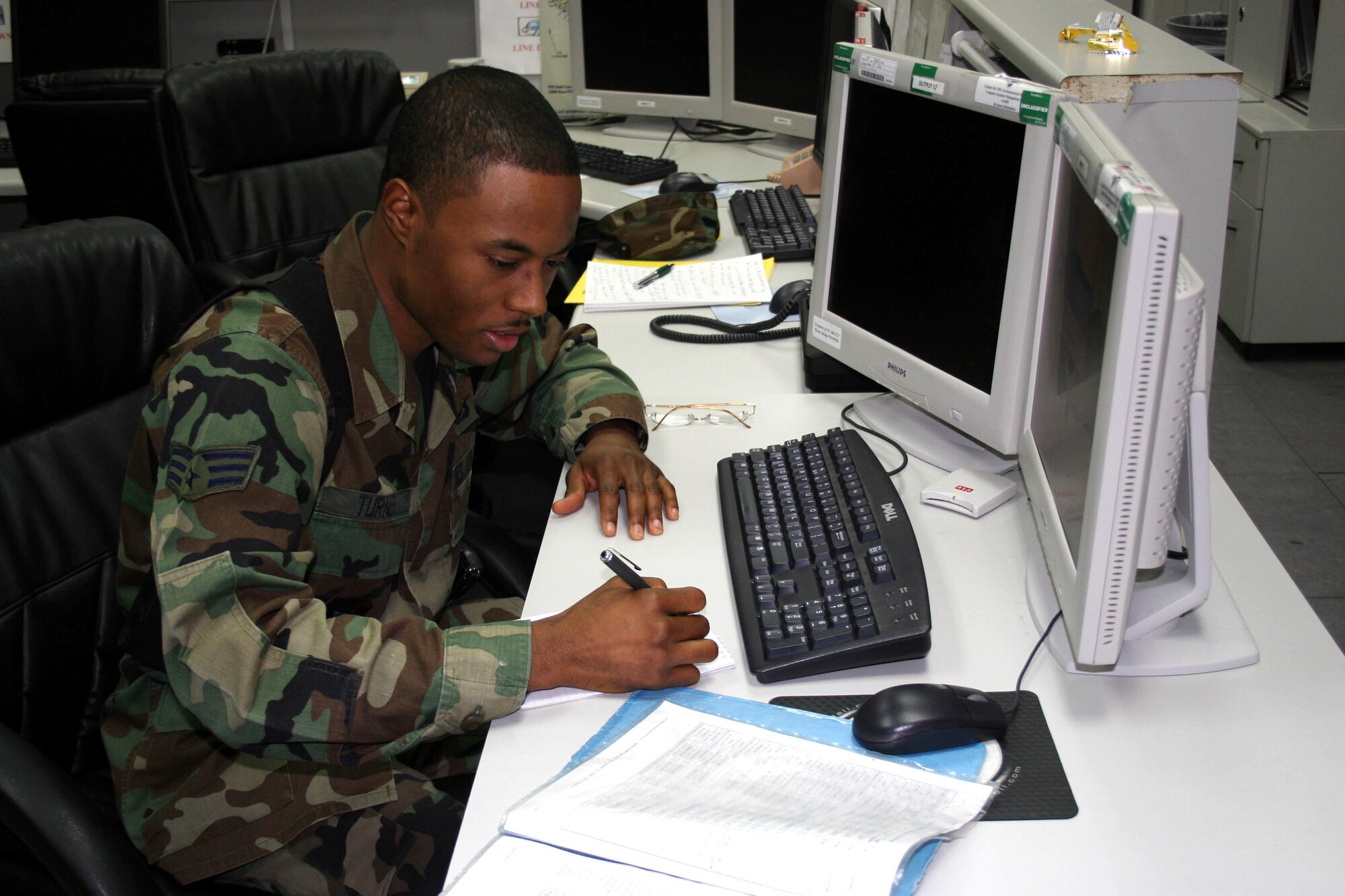 Senior Airman Terrance Turner deciphers an encrypted message at the command post at Incirlik Air Base, Turkey. Like all command post workers, Airman Turner plays an important role in the base mission by passing critical information to base leaders. The Airman is with the 39th Air Base Wing. (U.S. Air Force photo/Staff Sgt. Oshawn Jefferson)