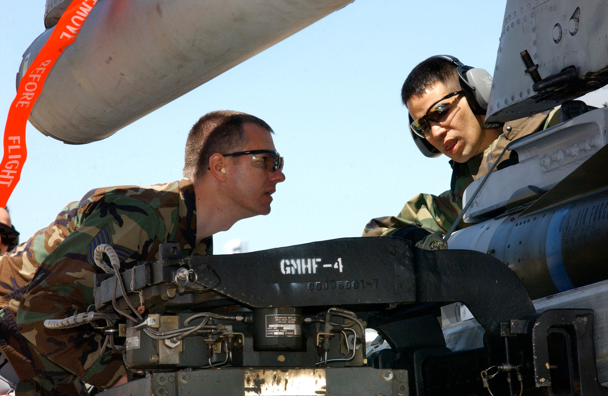 Tech. Sgt. Scott Edsell (left) and Senior Airman Daniel Bonora prepare to mount an AGM 65 Maverick missile on an A-10 Thunderbolt II during the first phase of an operational readiness inspection at Willow Grove Air Reserve Station, Pa., on Saturday, April 29, 2006. Sergeant Edsell and Airman Bonora are with the Pennsylvania Air National Guard's 111th Maintenance Squadron. (U.S. Air Force photo/Staff Sgt. Marie Harmon) 
