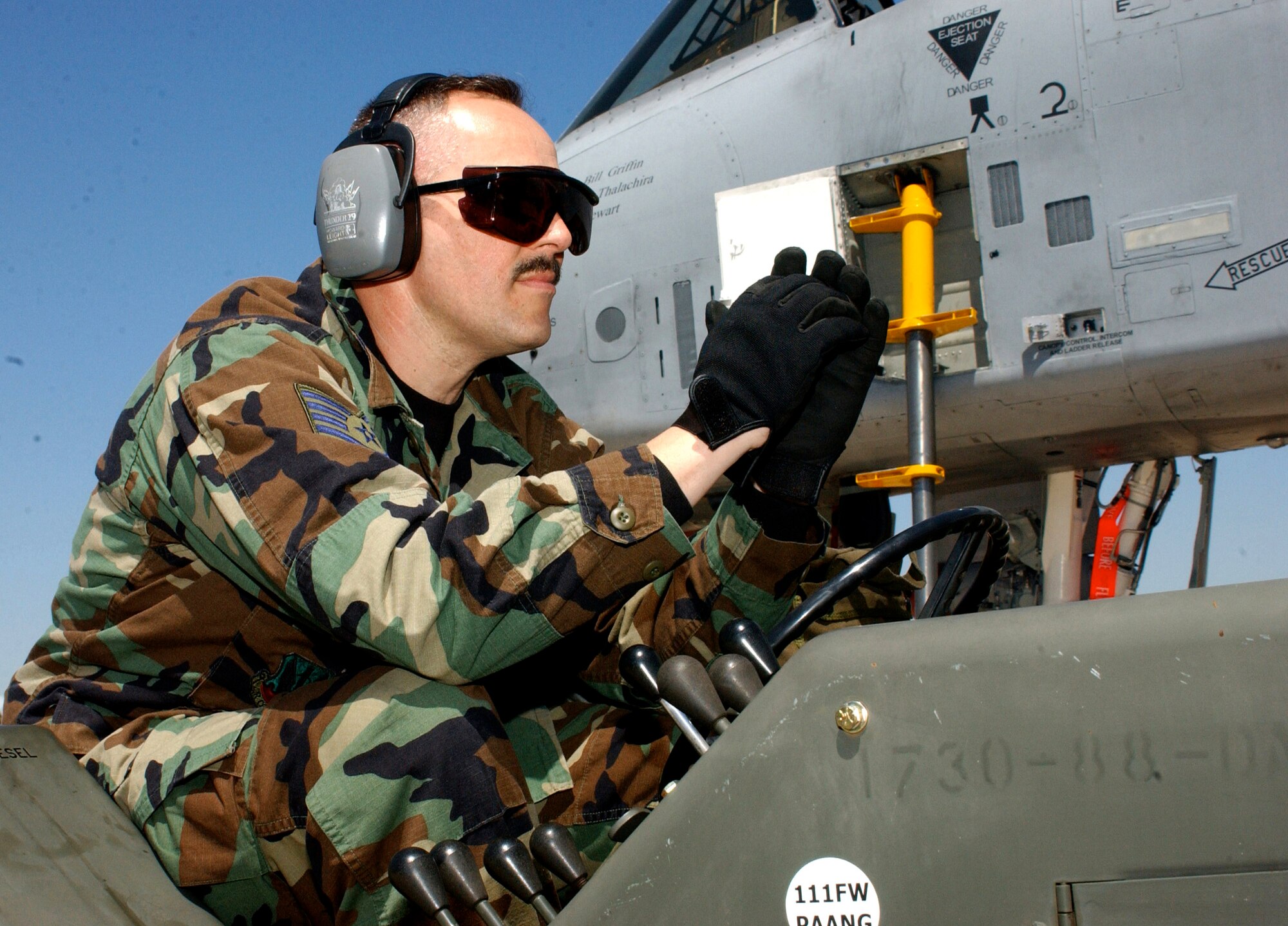 Tech. Sgt. Bruce Hart observes his crew during the first phase of an operational readiness inspection at Willow Grove Air Reserve Station, Pa., on Saturday, April 29, 2006. Sergeant Hart is with the Pennsylvania Air National Guard's 111th Maintenance Squadron. (U.S. Air Force photo/Staff Sgt. Marie Harmon) 
