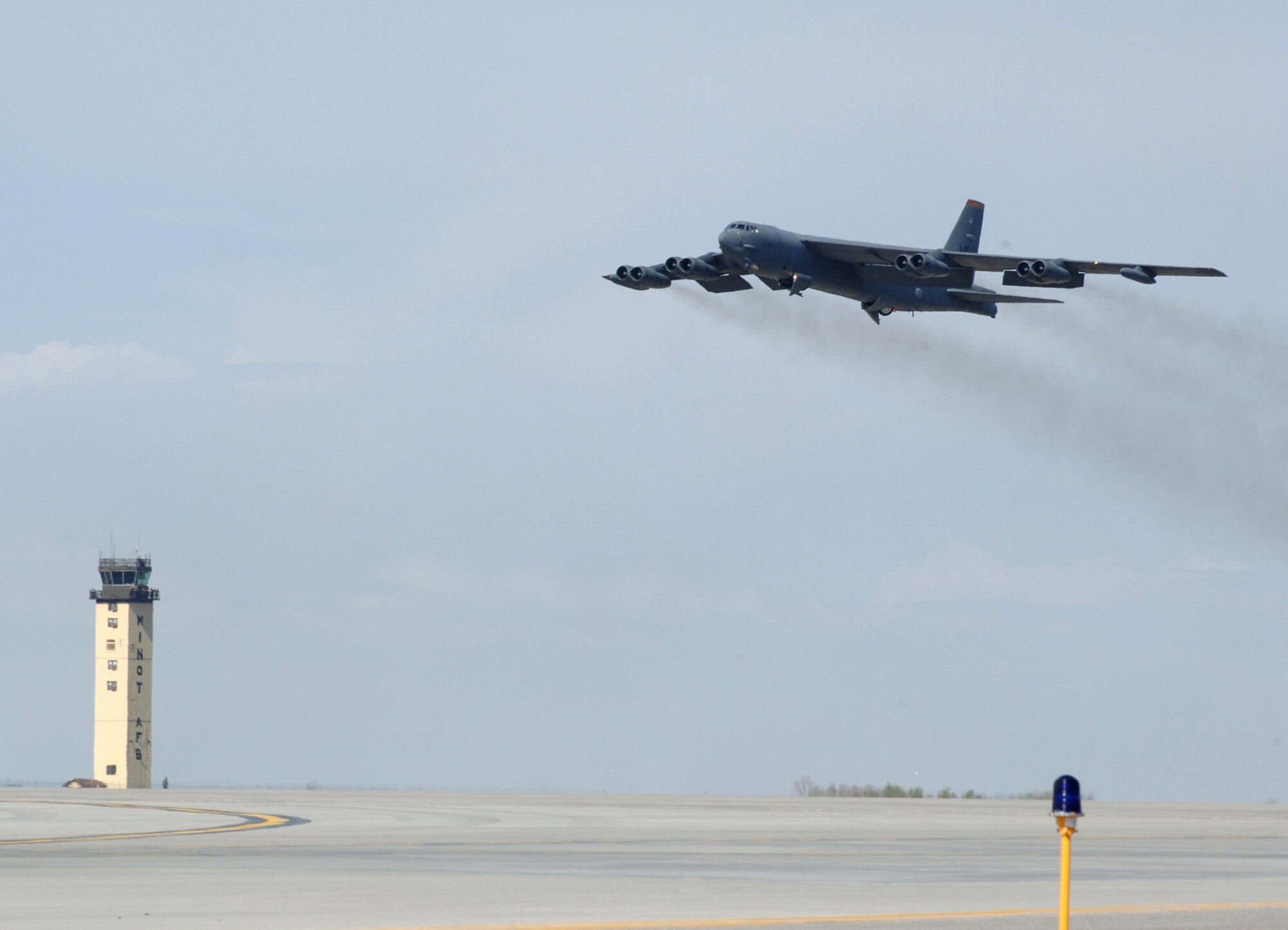 A B-52 Stratofortress takes off from Minot Air Force Base, N.D., during a nine-ship rapid-launch generation exercise on Thursday, April 27, 2006.  Generation exercises test the base's ability to perform its mission. (U.S. Air Force photo/Airman 1st Class Christopher Boitz) 
