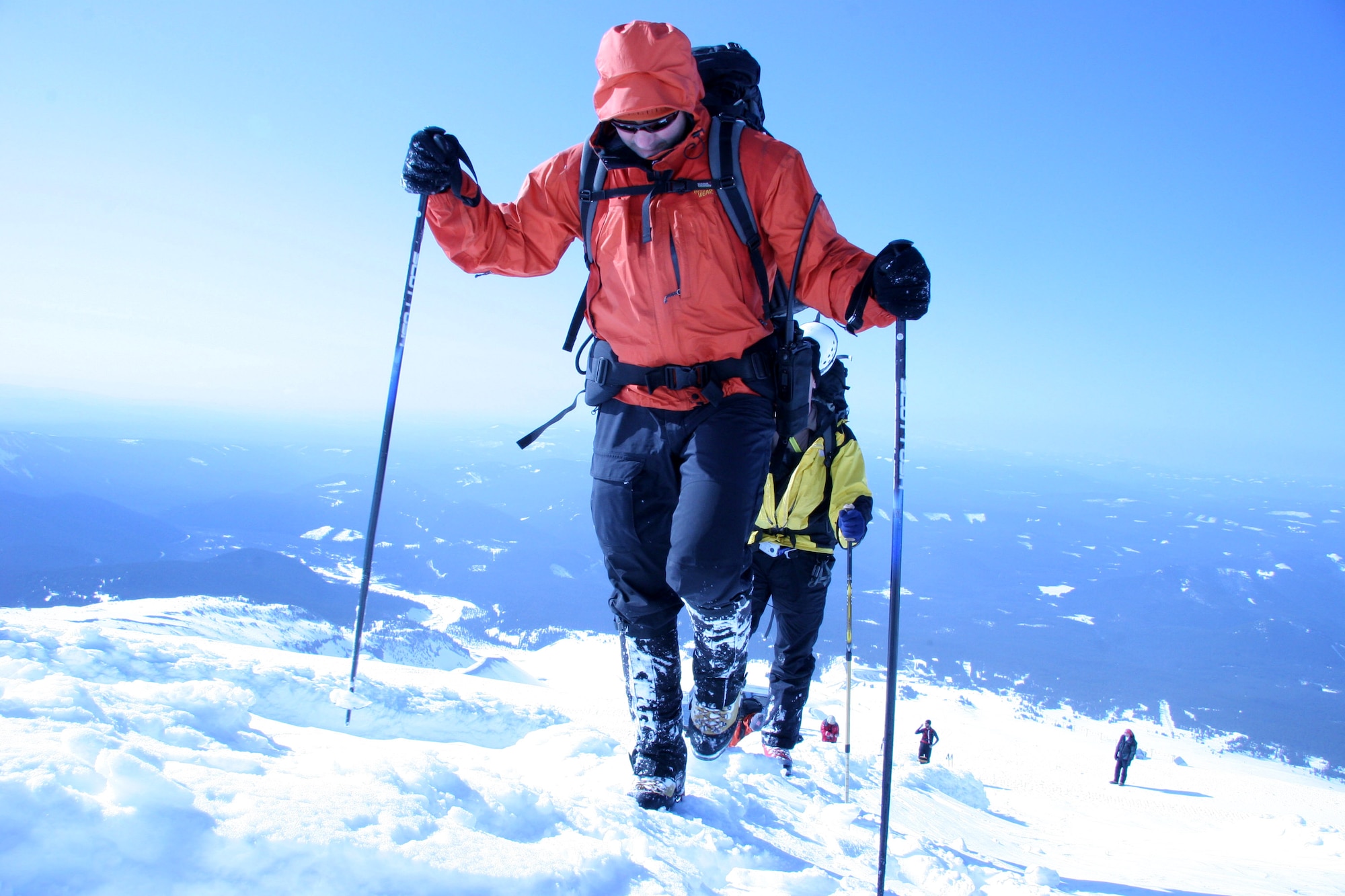 Master Sgt. Eric Giacchino uses walking poles to climb Mount Hood while searching for two "lost" climbers during a search and rescue exercise on Saturday, April 22, 2006. Sergeant Giacchino is a pararescueman with Air Force Reserve Command's 304th Rescue Squadron. (U.S. Air Force photo/Ruby Zarzyczny) 