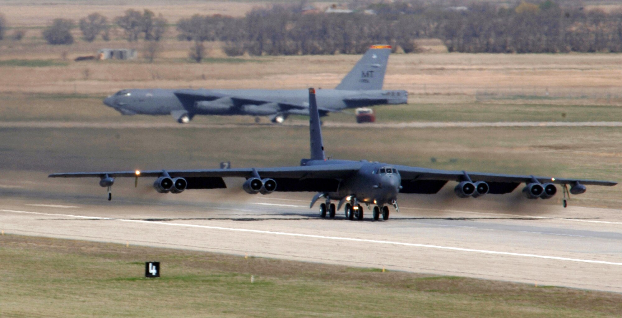 A B-52 Stratofortress taxis for take-off at Minot Air Force Base, N.D., during a nine-ship rapid-launch generation exercise on Thursday, April 27, 2006. Generation exercises test the base's ability to perform its mission. (U.S. Air Force photo/Senior Airman Stacy Moless)
