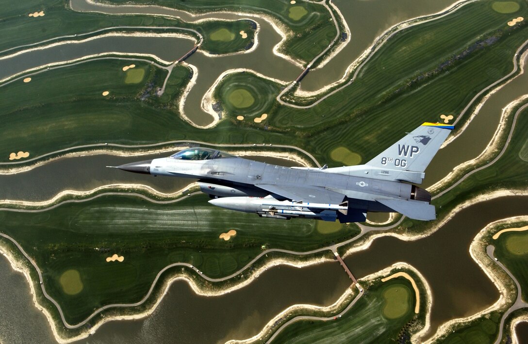 An F-16 Fighting Falcon from the 8th Fighter Wing at Kunsan Air Base, South Korea, flies near the base on Friday, April 28, 2006. The F-16 was flown by Col. Eric Best, 8th Operations Group commander. (U.S. Air Force photo/Master Sgt. Richard Freeland) 
