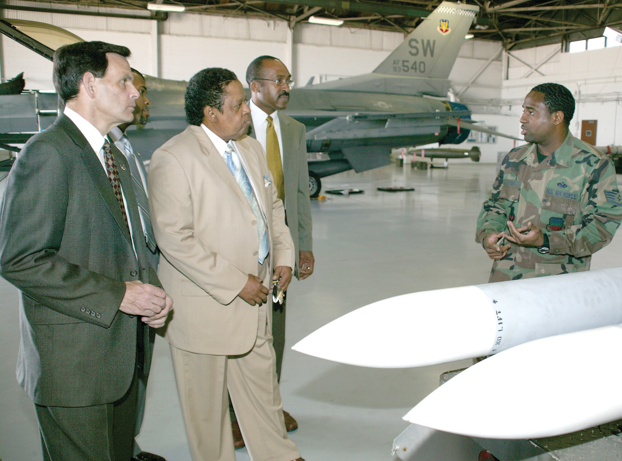 Members of the Commission for Accreditation for Law Enforcement receive a briefing Thursday about F-16 ordance at the Weapons Standardization Section Training facility.  The team visited Shaw following completion of the Sumter Police Department's reaccreditation process.  Sumter Police Chief Patty Patterson is an honorary commander with the 20th Security Forces Squadron.  (U.S. Air Force Photo/Senior Airman Susan Penning)