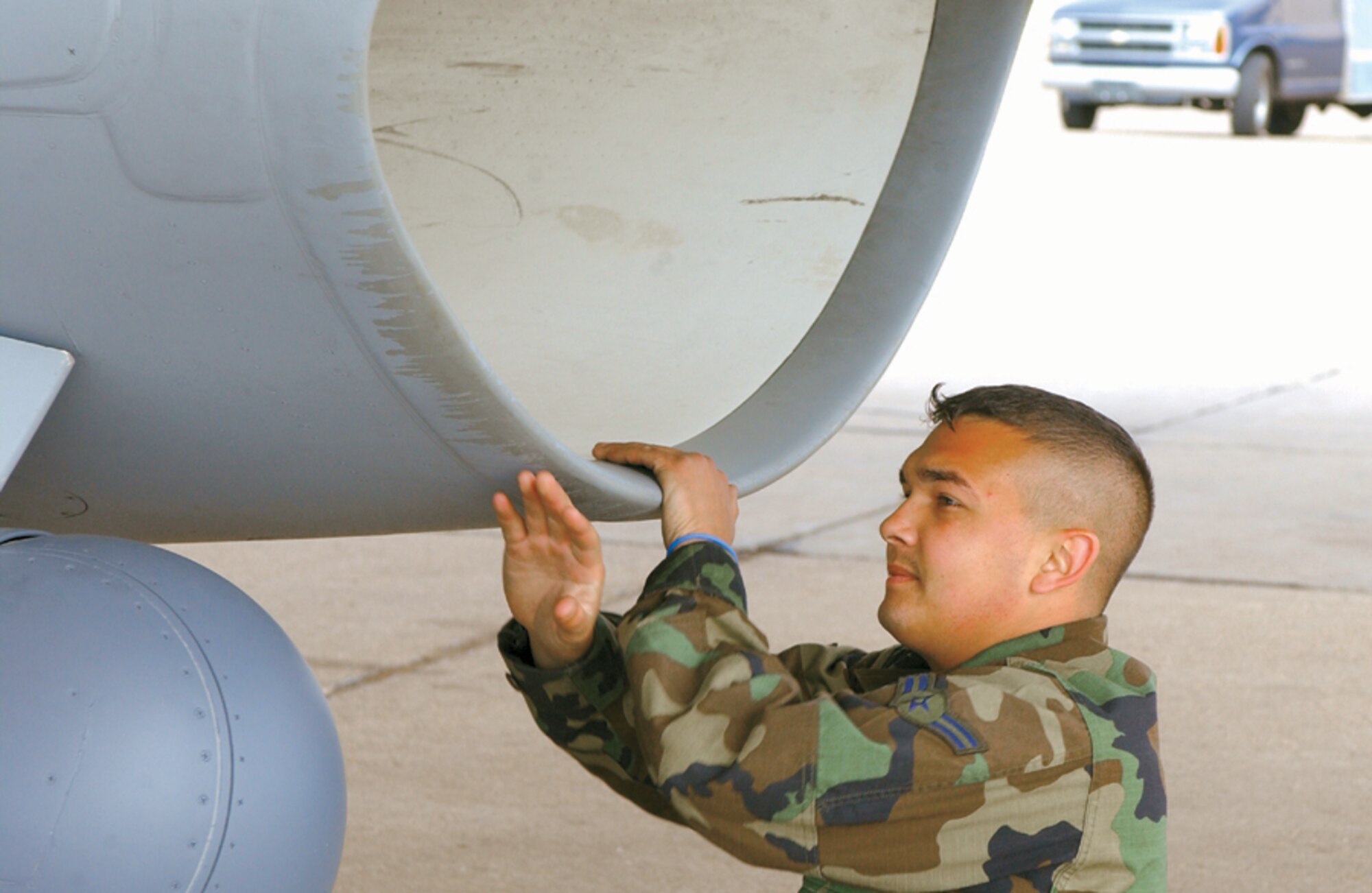 CANNON AIR FORCE BASE, N.M. - Airman 1st Class Craig Roland performs a final inspection of a 523rd Fighter Squadron jet prior to its departure to Nellis Air Force Base, Nev. Airman Roland is a crew chief with the 27th Aircraft Maintenance Squadron. (U.S. Air Force photo by Staff Sgt. April Wickes)