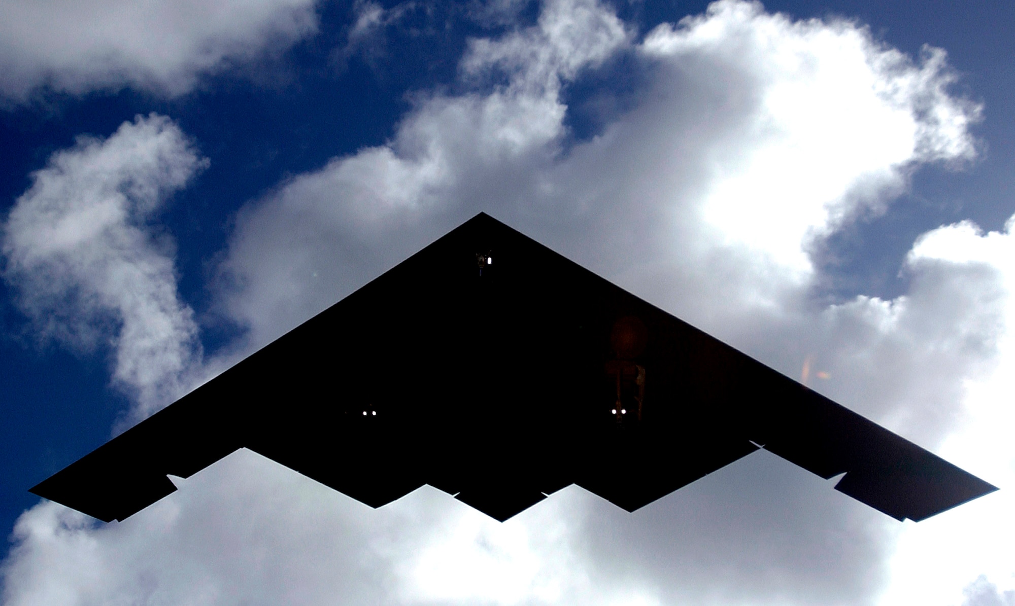 A B-2 Spirit lands at Andersen Air Force Base, Guam, on Sunday, April 30, 2006. B-2s are replacing the B-1B Lancers at Andersen as part of the continuous bomber rotation. (U.S. Air Force photo/Airman 1st Class Michael S. Dorus)