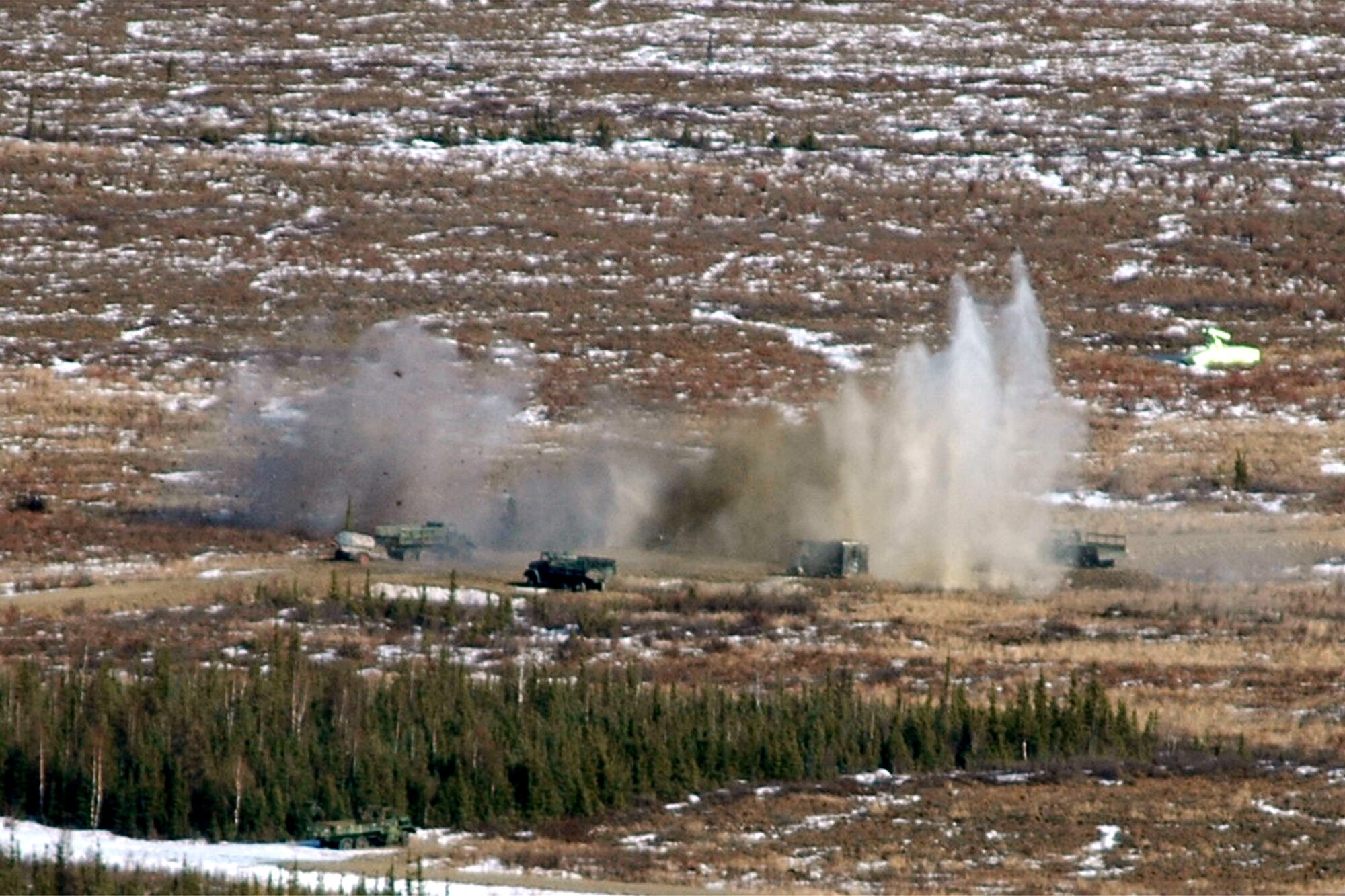 An A-10 Thunderbolt II pilot strafes a "hostile" convoy at the bombing range at Eielson Air Force Base, Alaska, on Friday, April 28, 2006, during Red Flag-Alaska. Joint terminal attack controllers from the 25th Air Support Operations Squadron at Hickam AFB, Hawaii, called in air support and directed planes to their targets as part of the exercise. The A-10 is from the 75th Fighter Squadron at Pope AFB, N.C. (U.S. Air Force photo/Tech. Sgt. Jeff Walston)