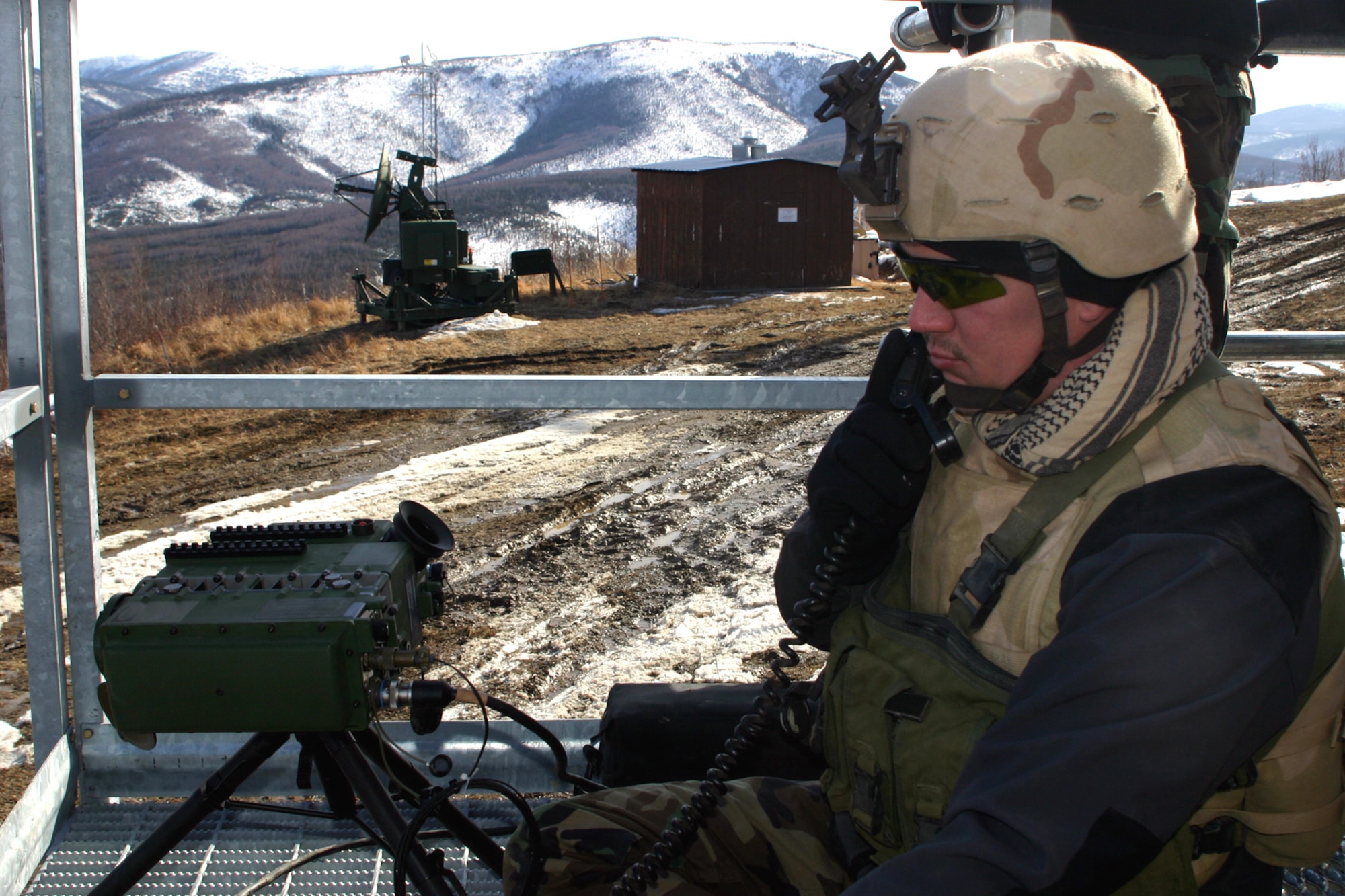 Staff Sgt. Neil Adams prepares to hit a target with a marker during a close-air-support mission at Eielson Air Force Base, Alaska, on Friday, April 28, 2006, during Red Flag-Alaska. Sergeant Adams is a joint terminal attack controller with the 25th Air Support Operations Squadron at Hickam AFB, Hawaii. (U.S. Air Force photo/Capt. Aaron Wiley)