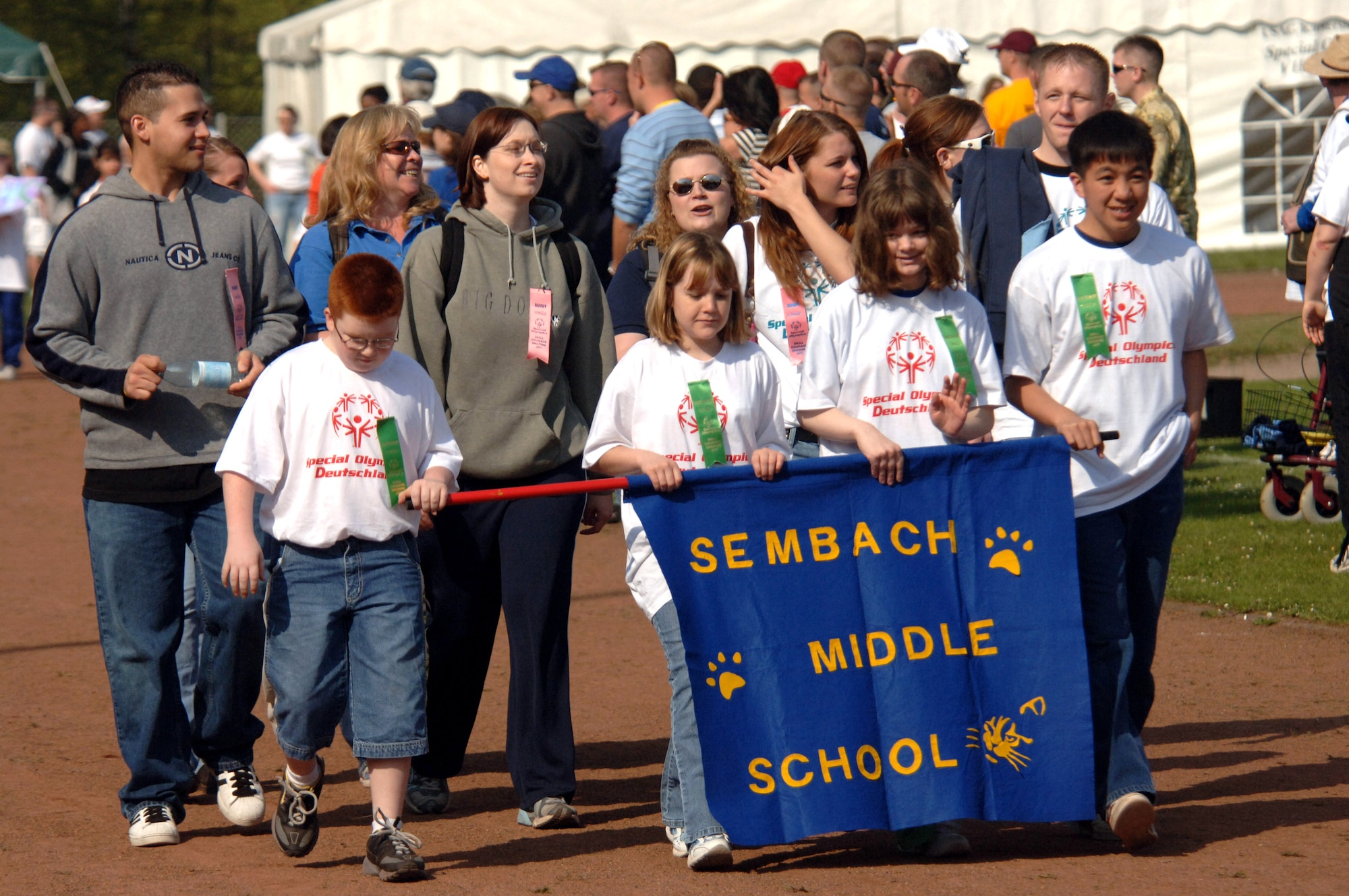 Students from Sembach Middle School participate in the Special Olympics opening ceremonies at Enkenbach-Alsenborn, Germany, on Wednesday, May 3, 2006. This is the 29th time the games were held in this part of Germany. Volunteers usually outnumber the athletes. (U.S. Air Force photo/Master Sgt. John E. Lasky) 
