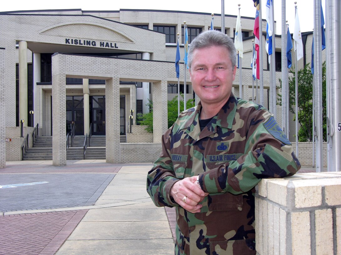 Chief Master Sgt. of the Air Force Gerald R. Murray stands in front of the Senior NCO Academy's Kisling Hall at Maxwell-Gunter Air Force Base, Ala. (U.S. Air Force photo/Carl Bergquist )

