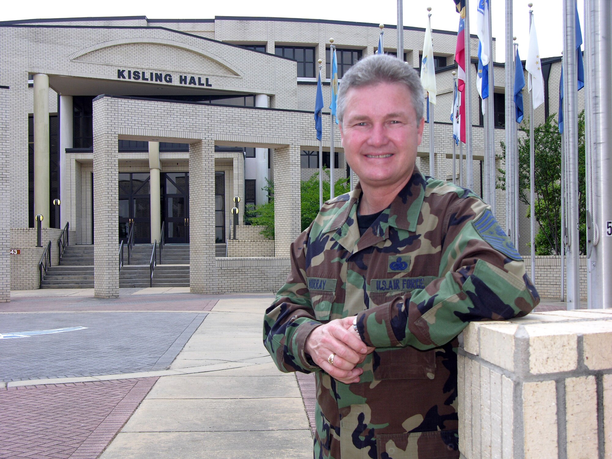 Chief Master Sgt. of the Air Force Gerald R. Murray stands in front of the Senior NCO Academy's Kisling Hall at Maxwell-Gunter Air Force Base, Ala. (U.S. Air Force photo/Carl Bergquist )

