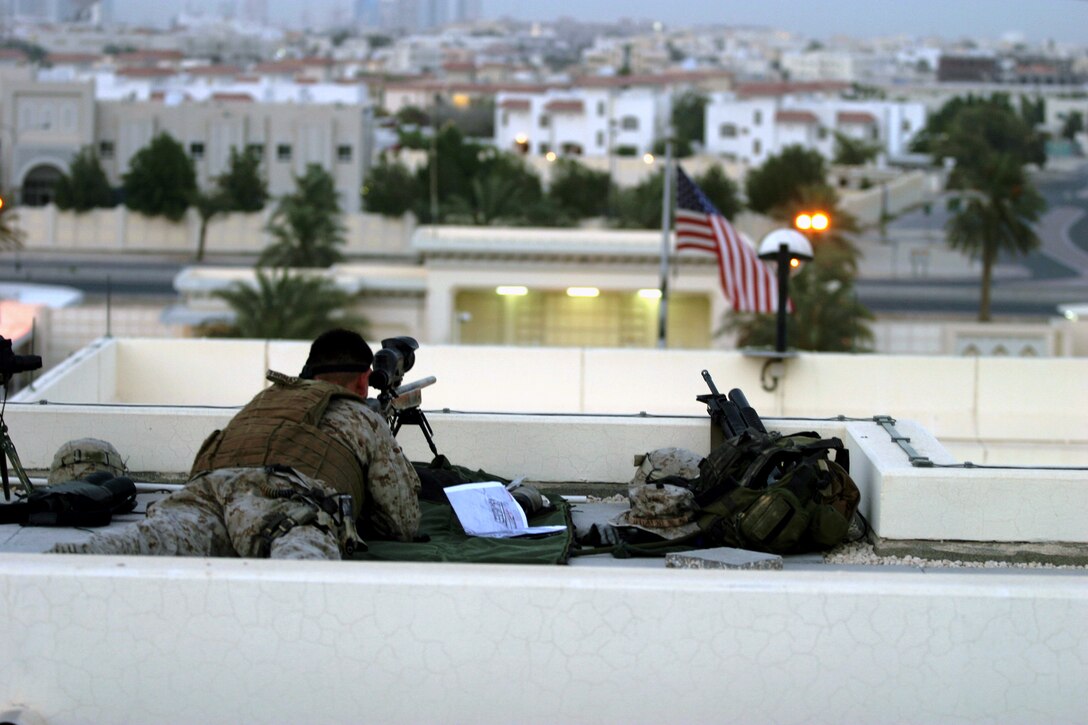 Lance Cpl. Christopher B. Lampson works late into the night keeping the administrative records of Marine Fighter Attack Squadron 533, Marine Aircraft Group 16 (Reinforced), 3rd Marine Aircraft Wing, at Al Asad, Iraq, May 3. Lampson and the other Marines who work in the Hawks' S-shops manage the Hawk's personnel records, intelligence, training and operations, logistics and communications. Lampson is a personnel clerk and Brownwood, Texas, native.