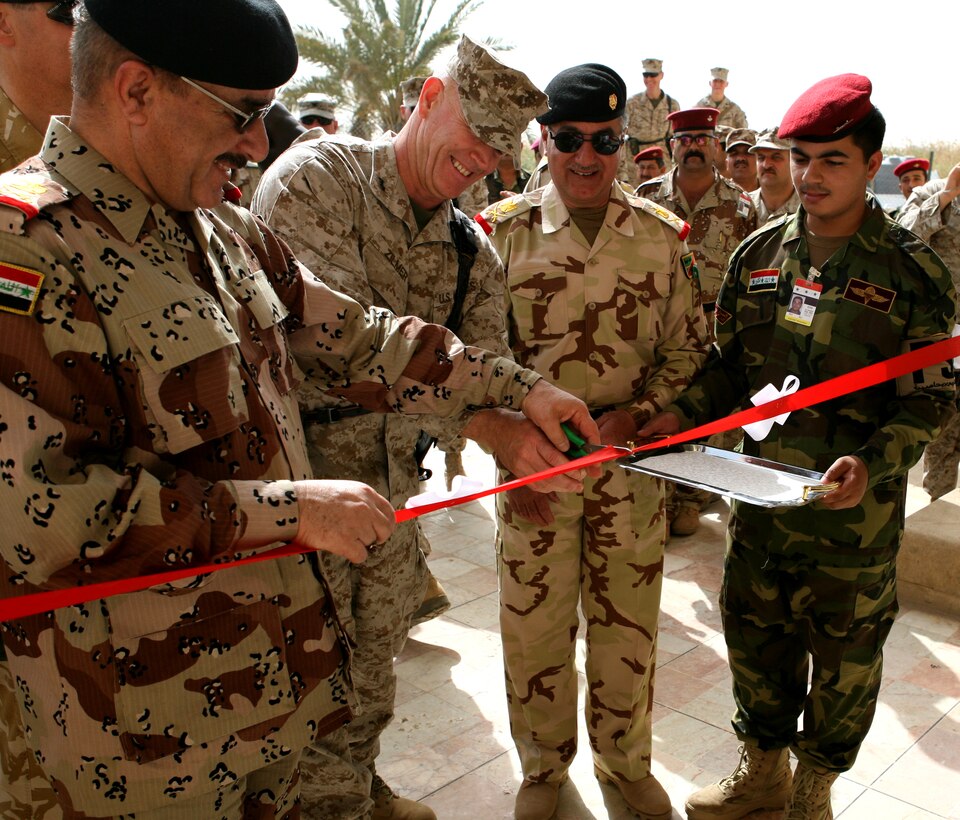 RAMADI, Iraq -- Maj. Gen. Richard M. Zilmer, commanding general, Multi-National Forces-West, helped cut the ribbon to the new headquaters  building for the 7th Iraqi Army Division at Camp Blue Diamond May 9. The building that once served as a retreat for Sadam Hussein and his extended family will soon be home for more than 1,500 Iraqi Army soldiers shceduled to work in support of the division.