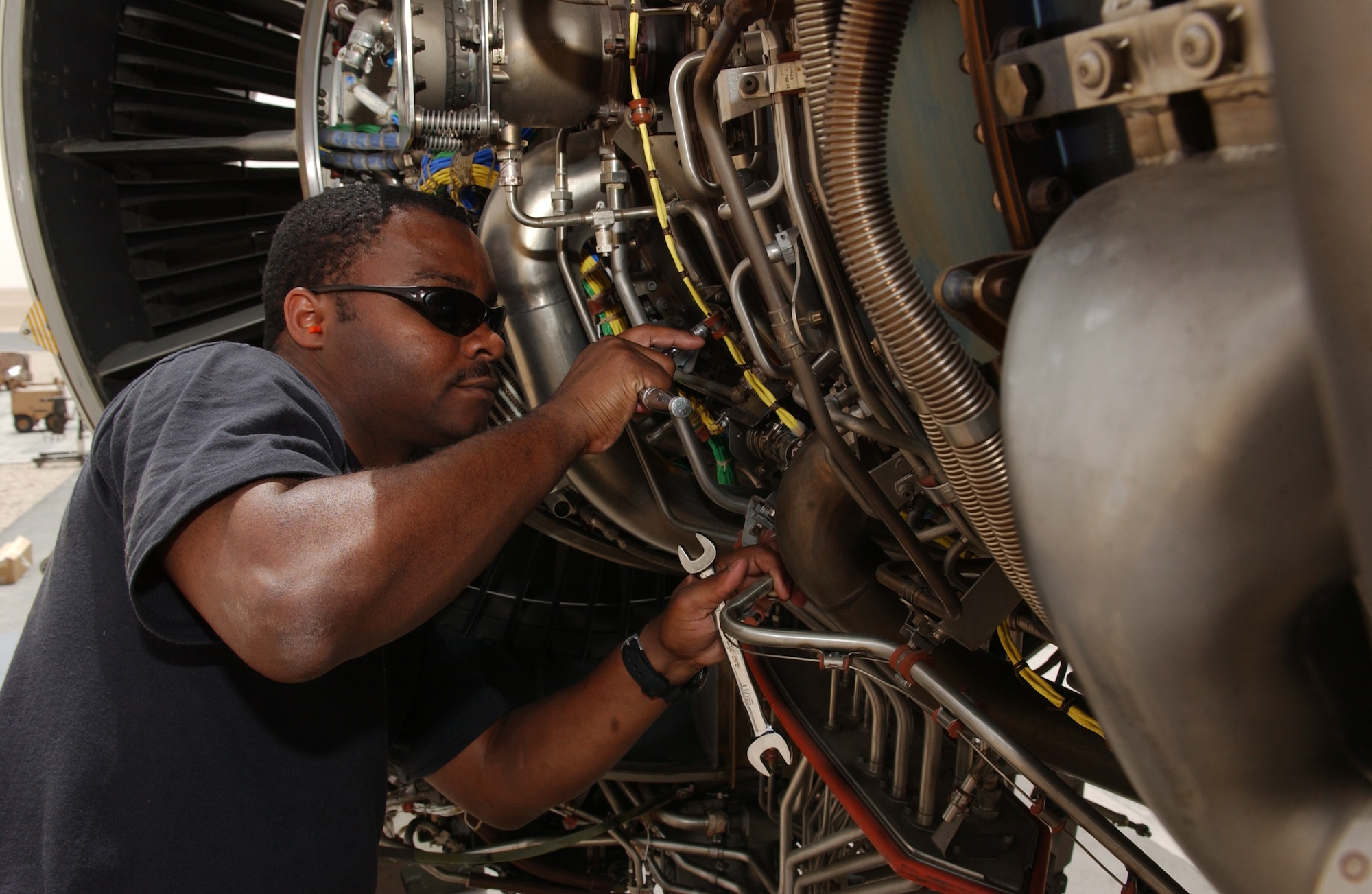 Staff Sgt. Ronald Broughton, 8th Expeditionary Air Mobility Squadron C-17 propulsion technician, works on a  C-17 Globemaster III jet engine here Tuesday, May 2. The mission of the 8th EAMS maintenance flights provides strategic maintenance on intertheater and intratheater heavy aircraft such as the C-17 and C-5 as well as transient aircraft, like the KC-10. Sergeant Broughton is deployed from McChord Air Force Base, Wash. (U.S. Air Force photo/Senior Airman Rachel Walters)

