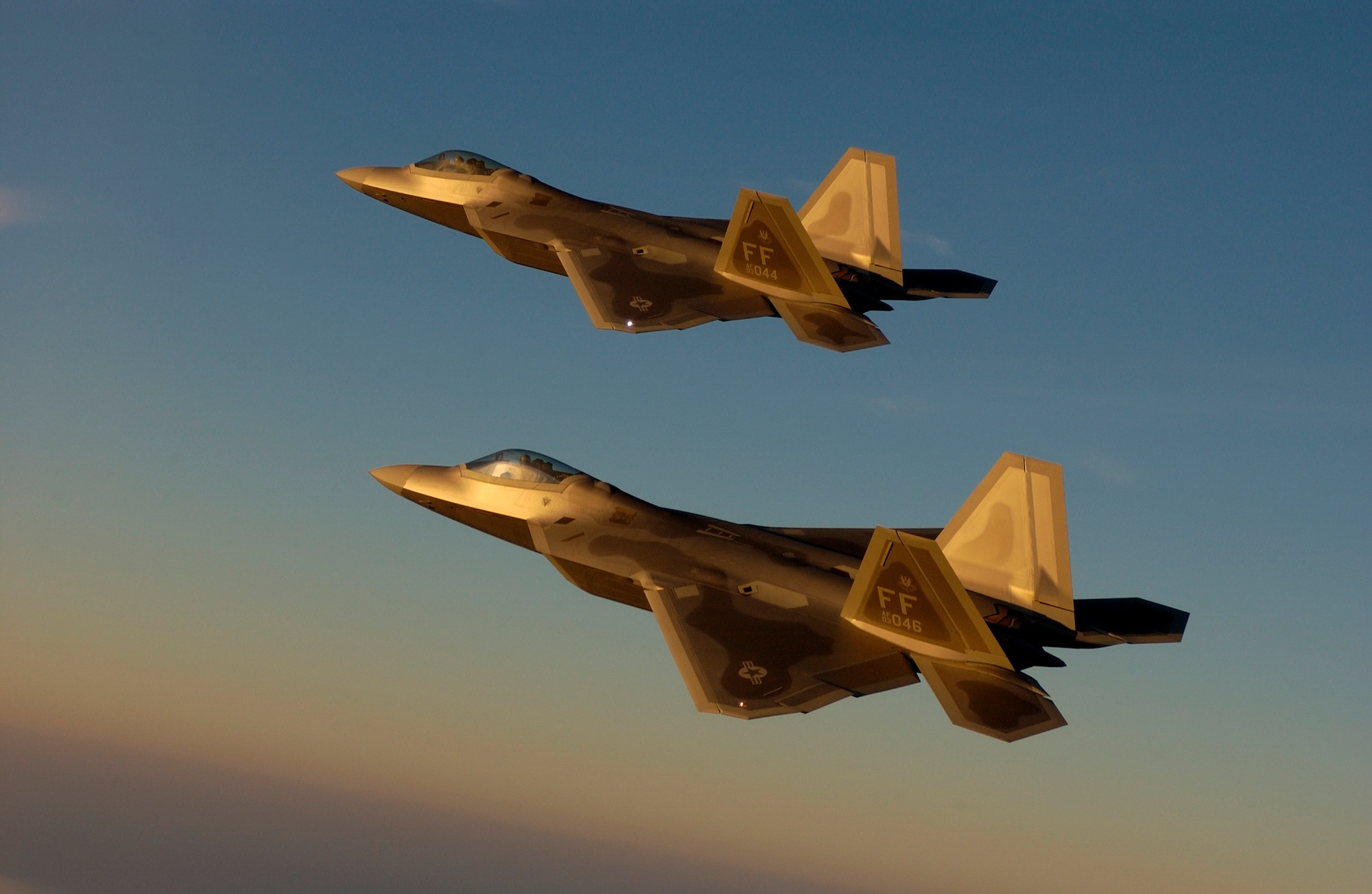 F-22A Raptors fly over Langley Air Force Base, Va., on Sept. 9, 2005. (U.S. Air Force photo/Tech. Sgt. Ben Bloker) 
