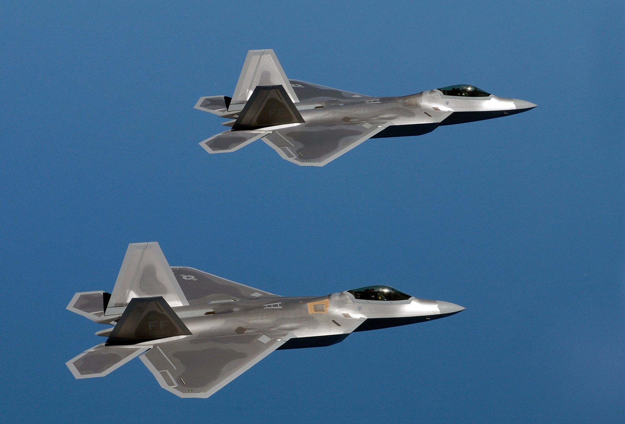 F-22A Raptors fly over Langley Air Force Base, Va., on Aug. 12, 2005. (U.S. Air Force photo/Tech. Sgt. Ben Bloker)
