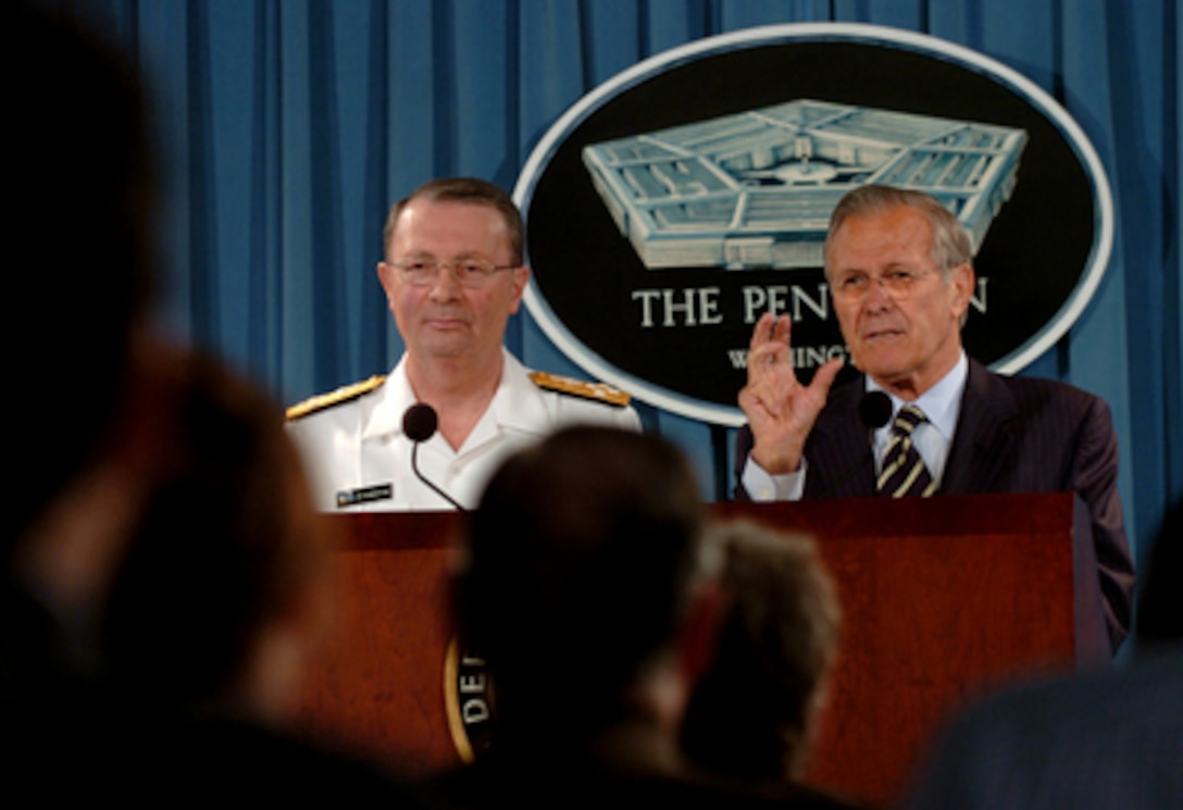 Secretary of Defense Donald H. Rumsfeld gestures to make his point as he answers a reporter's question during a press briefing with Vice Chairman of the Joint Chiefs of Staff Adm. Edmund Giambastiani, U.S. Navy, in the Pentagon on May 9, 2006. Rumsfeld and Giambastiani gave opening remarks then took questions. 