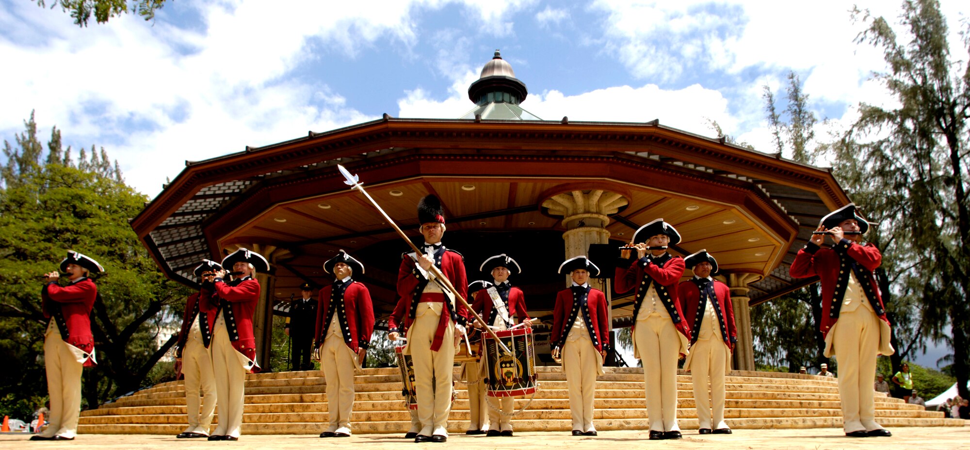 Members of the U.S. Army's Old Guard Fife and Drum Corps perform at a concert on Saturday, May 6, 2006, in downtown Honolulu. The group, part of the 3rd United States Infantry Regiment, is the only unit of its kind in the armed forces. The uniforms are patterned after those worn by the musicians in George Washington's Continental Army. The performance was part of a USO "Salute to our Troops" celebration. (U.S. Air Force photo/Tech. Sgt. Shane A. Cuomo) 