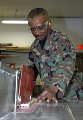 YOUNGSTOWN AIR RESERVE STATION, Ohio-- Air Force Reserve Tech. Sgt. Frank Woodford, a structures craftsman with the 910th Civil Engineer Squadron here, cuts a piece of wood for a project during the May Unit Training Assembly at the 910th CES structures shop.  About 45 reservists from the squadron are scheduled for an annual tour deployment to a Washoe Indian Reservation in Carson City, Nev. later this spring where they will work on building new homes and other projects. The Washoe Tribe of Nevada and California is a federally recognized Indian Tribe organized pursuant to the Indian Reorganization Act of June 18, 1934, as amended.   The Tribe has four communities, three in Nevada (Stewart, Carson, and Dresslerville), and one in California (Woodfords).   There is also a Washoe community located within the Reno-Sparks Indian Colony. The Tribe has jurisdiction over trust allotments in both Nevada and California, with additional Tribal Trust parcels located in Alpine, Placer, Sierra, Douglas, Carson, and Washoe Counties.   
(U.S. Air Force photo/Master Sgt. Bryan Ripple)
