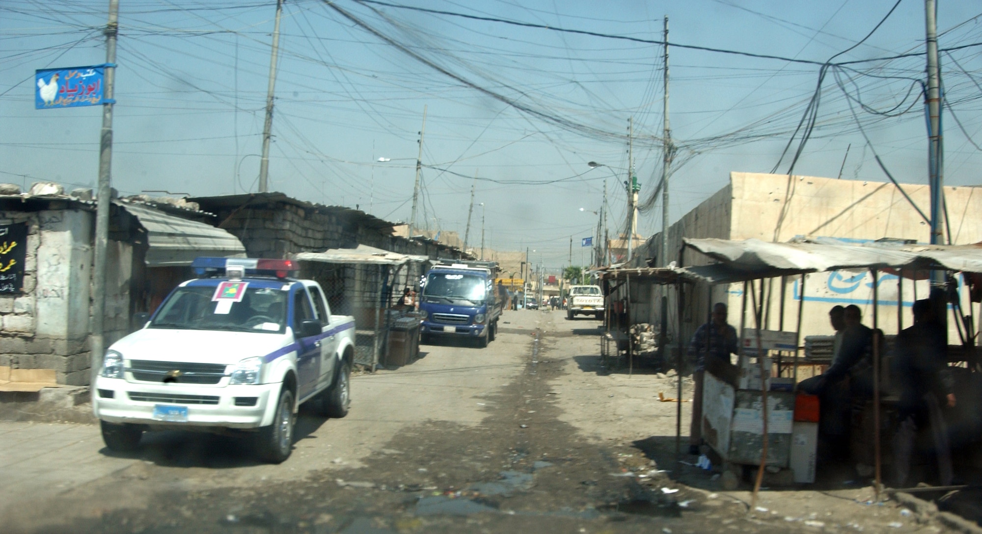An Iraqi police truck sits on a street in Mosul, Iraq.  (U.S. Air Force photo/Senior Airman Jason Ridder)
