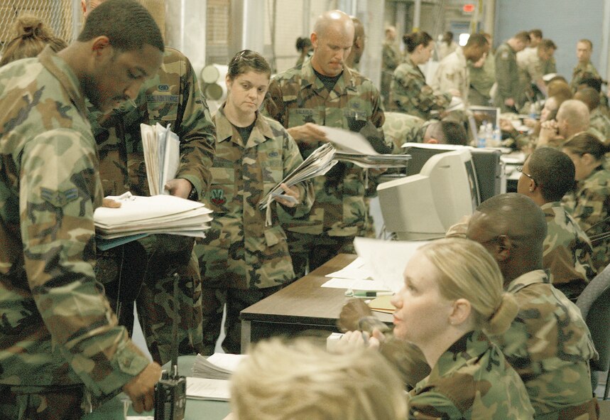 Shaw Airmen process through the mobility line Monday.  More than 450 Shaw members deploy in Air Expeditionary Force cycle 1 and 2 in support of the Global War on Terror.  (U.S. Air Force Photo/Senior Airman John Gordinier)