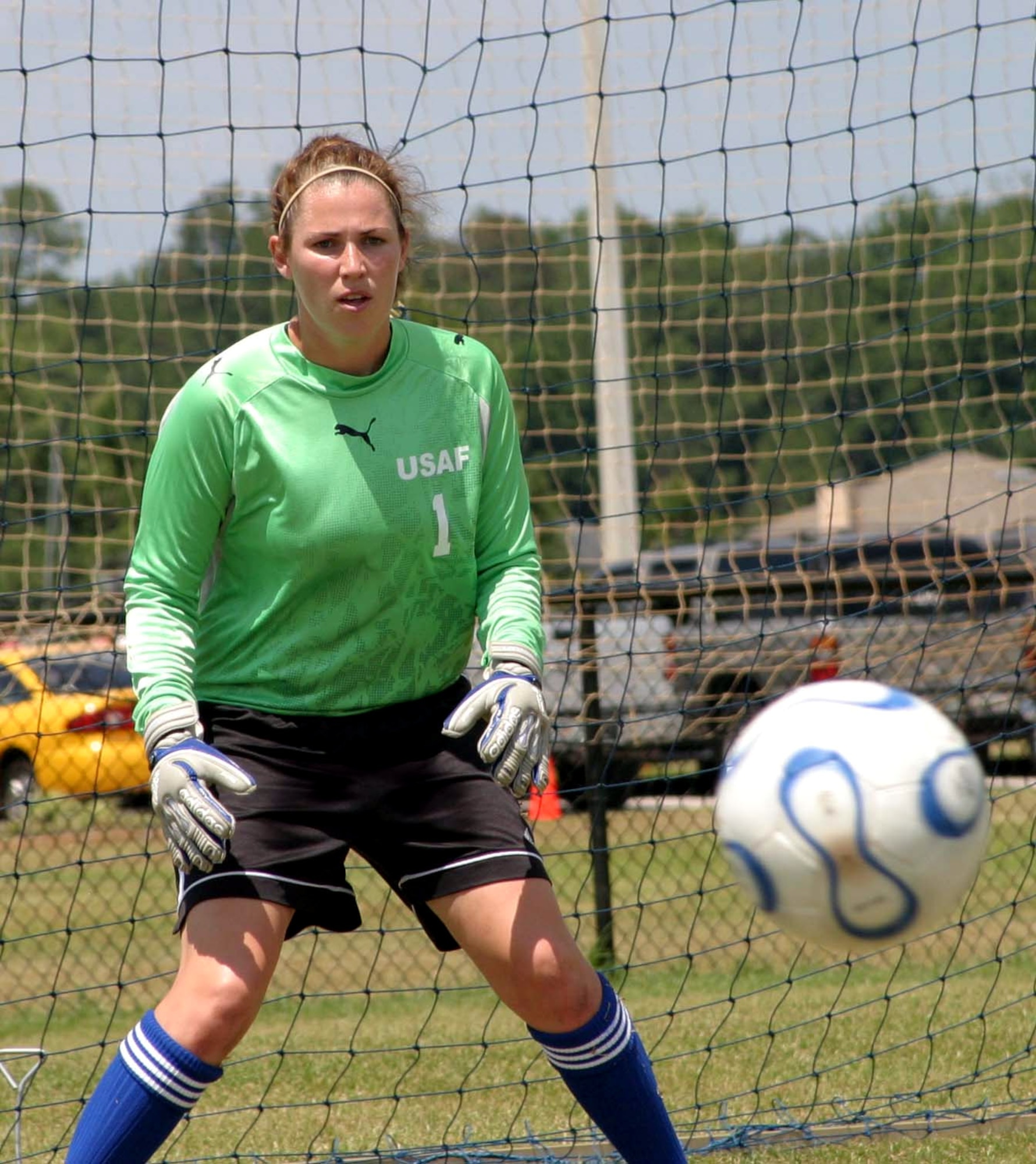 Jennifer Wolf blocks a shot during the 2006 armed forces women's soccer championship at Naval Station Mayport, Fla. The Air Force team won the tournament, held May 2 to 8.  Wolf, from Corpus Christi Naval Air Station, Texas, was selected to the all-tournament team. (U.S. Air Force photo)
