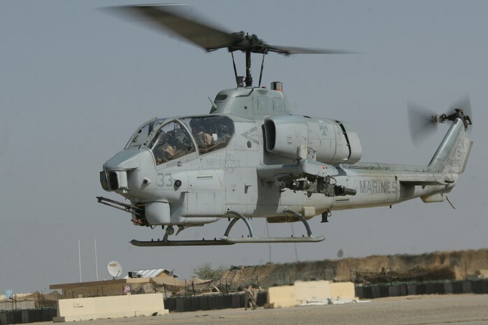 An AH-1W Super Cobra helicopter taxis toward the flight line at Al Taqaddum, Iraq, May 11. The aircraft belongs to Marine Light Attack Helicopter Squadron 169, Marine Aircraft Group 16 (Reinforced), 3rd Marine Aircraft Wing.