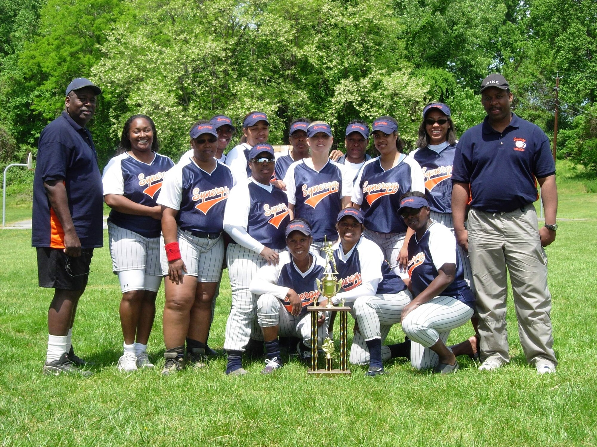 Members of the 459th Air Refueling Wing sponsored softball team, Synergy, pose together with a trophy they earned on May 7.  Synergy earned the second place trophy in the Walter Reed's Womens Classic.  Fort Myer took first place.  The 459th Air Refueling Wing is an Air Force Reserve Command unit.