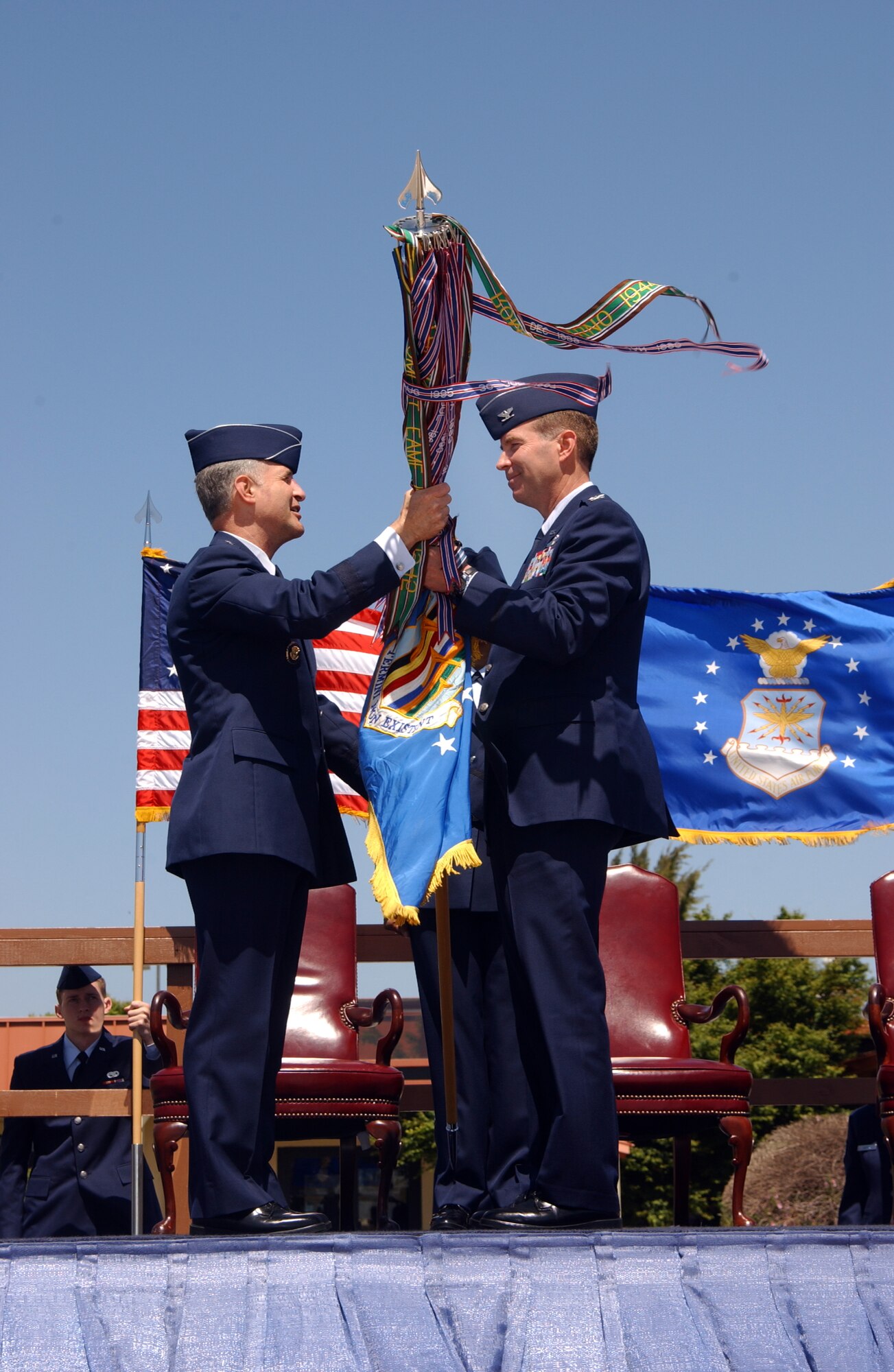 Col. Steven Arquiette receives command of the 60th Air Mobility Wing in a ceremony Monday. (U.S. Air Force photo by Nan Wylie)