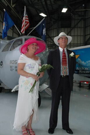 Senior Master Sgt. Robin Taylor, a reservist assigned to the 315th Airlift Wing at Charleston AFB, S.C., and Ronald "Panama" Huskey get married in front of the "Spirit of Hope, Liberty and Freedom", the miniature C-17 replica.  The wedding was originally planned to be help at Charleston AFB's Heritage Park and was moved in front of the Miniature C-17 because of rain.  (Photo by 1st Lt. Wayne Capps, USAFR)
