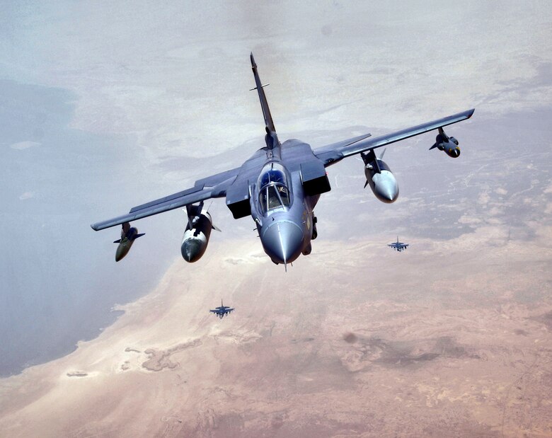 An RAF Tornado GR-4 positions itself behind a KC-135 Stratotanker for an air refueling on Sunday, May 14, 2006. The Tornado and crew are from the 617th Squadron at RAF Lossiemouth, Scotland. In the distance, two F-16 Fighting Falcons from the Air National Guard's 177th Fighter Wing in Atlantic City, N.J., await their "appointment" for air refueling. (U.S. Air Force photo/Master Sgt. Lance Cheung)