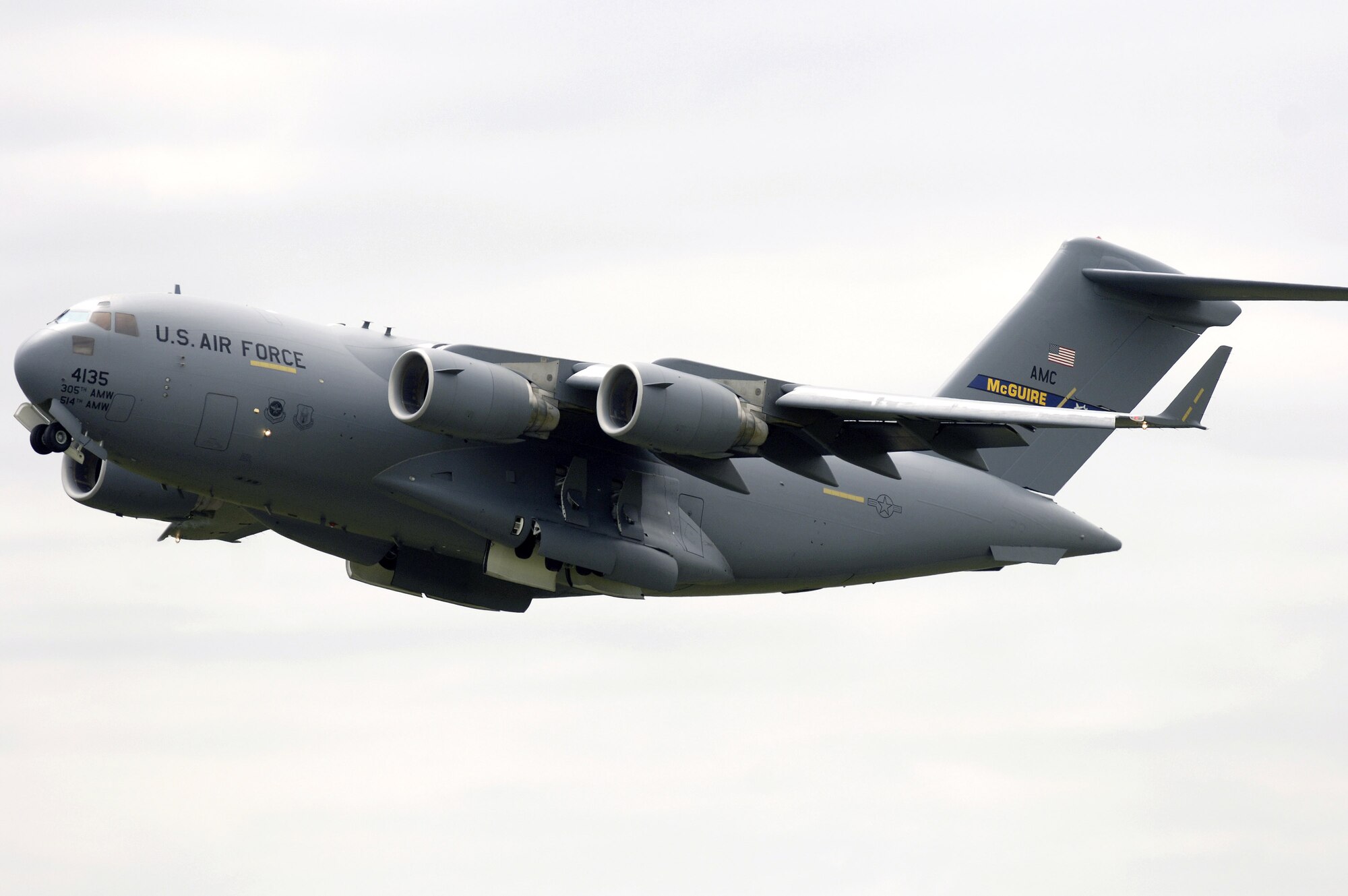 A C-17 Globemaster III from the 305th Air Mobility Wing flies over McGuire Air Force Base, N.J., on Wednesday, May 10, 2006. (U.S. Air Force photo/Brian Dyjak) 
