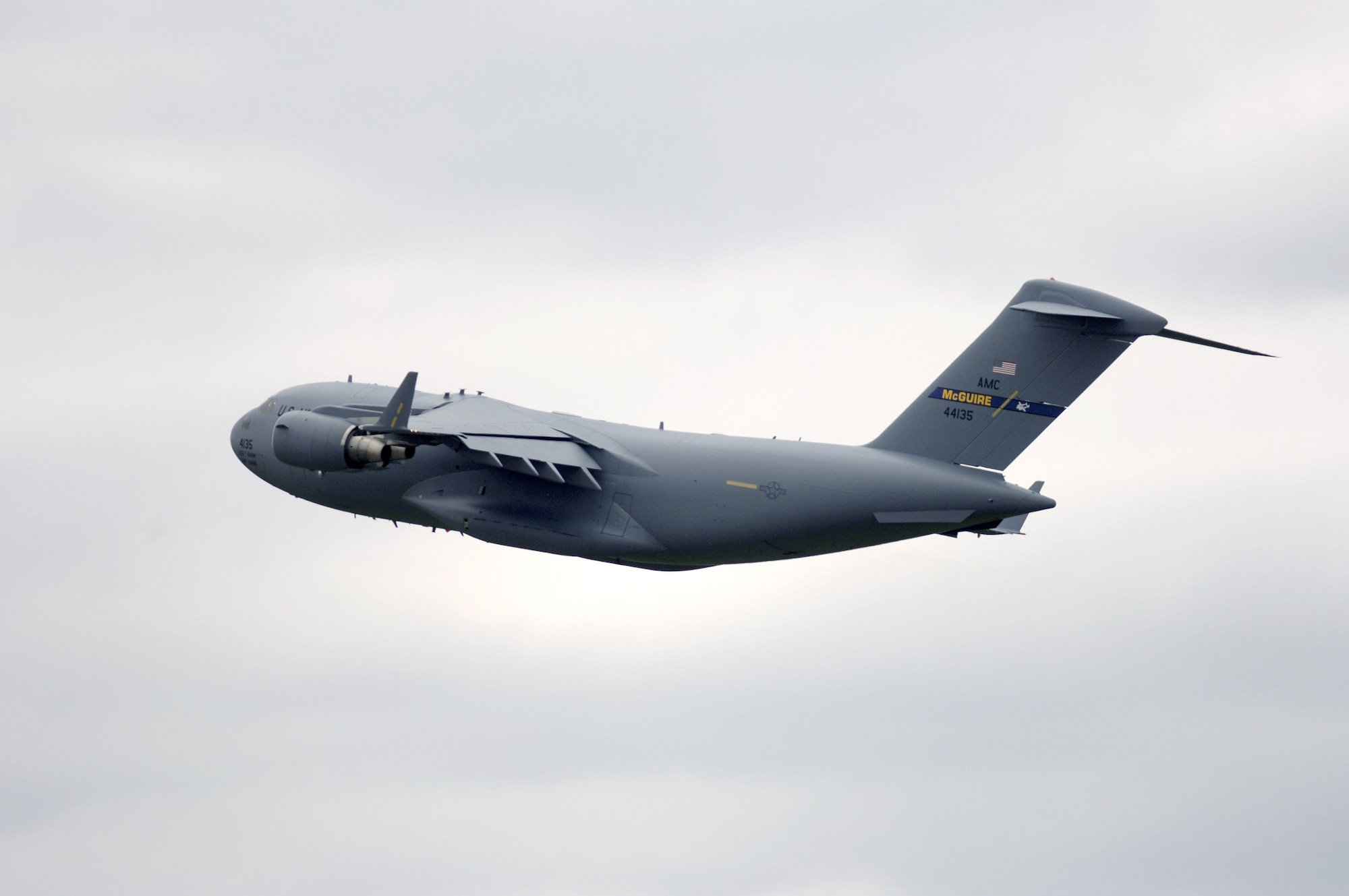 A C-17 Globemaster III from the 305th Air Mobility Wing flies over McGuire Air Force Base, N.J., on Wednesday, May 10, 2006. (U.S. Air Force photo/Brian Dyjak) 

