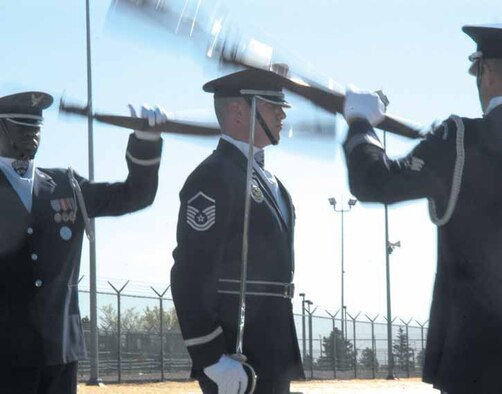 Members of the Air Force Honor Guard present a drill team demonstration at Schriever Air Force Base.  Airmen interested in joining the USAF Honor Guard should contact the Air Force Honor Guard at hgrecruiting@bolling.af.mil.