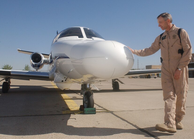 KIRTLAND AIR FORCE BASE, N.M. - Keith Amershek, air interdiction officer, performs a preflight check around a Cessna 250, which is regularly used by Customs and Border Protection. 