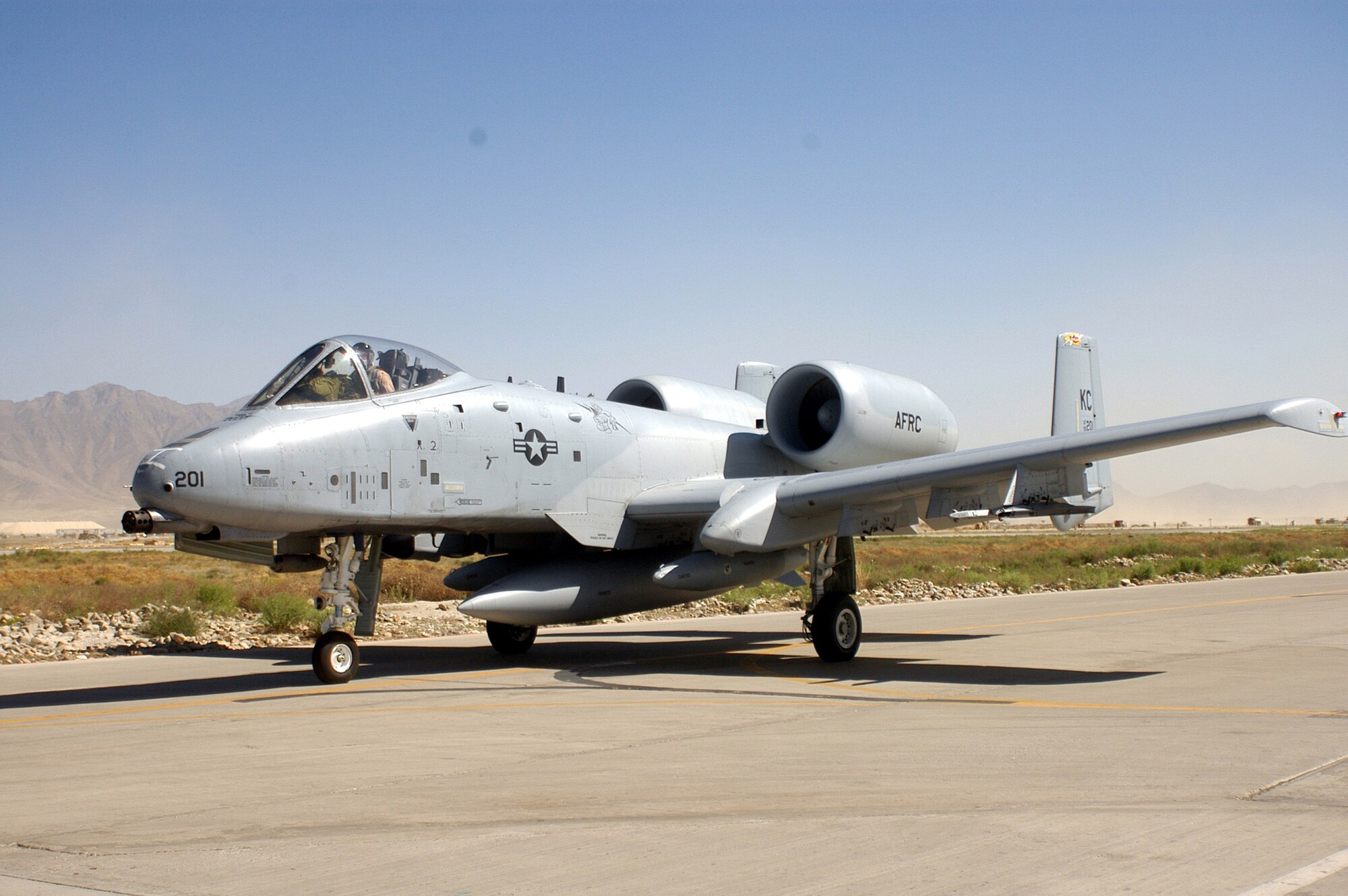BAGRAM AIRFIELD, Afghanistan -- An A-10 Thunderbolt II, flown by pilot, Maj. Mark Ernewein, from the 442nd Fighter Wing, an Air Force Reserve unit from Whiteman Air Force Base, Mo., arrives at its deployed location with the 455th Air Expeditionary Wing here May 13.  Pilots and maintainers from the 442nd FW and the 52nd Fighter Wing, from Spangdahlem Air Base, Germany, will conduct close air support and other air to ground operations in support of Operation Enduring Freedom in Afghanistan.  The A-10 carries a 30 mm gun and up to 16,000 pounds of bombs and missiles.  Its primary role is to support Army Soldiers and other forces operating on the ground.  (U.S. Air Force photo/Maj. David Kurle, 455 AEW/PA) 