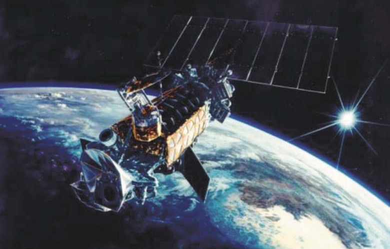 An artist's rendition of a DMSP satellite orbiting Earth.
