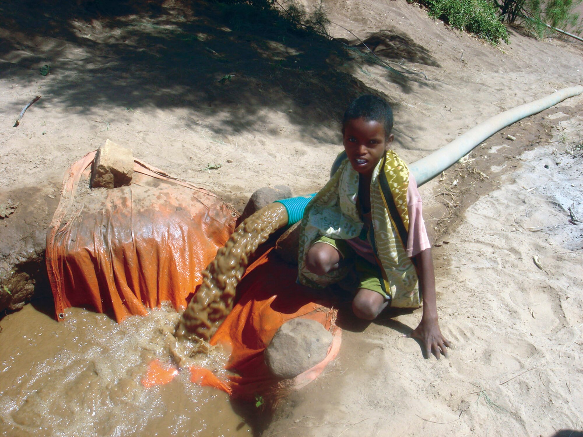 Thanks to a pump delivered by the 746th Air Expeditionary Wing, Ethiopians in the village of Gode can now irrigate the land and grow corn for the first time in years.                              