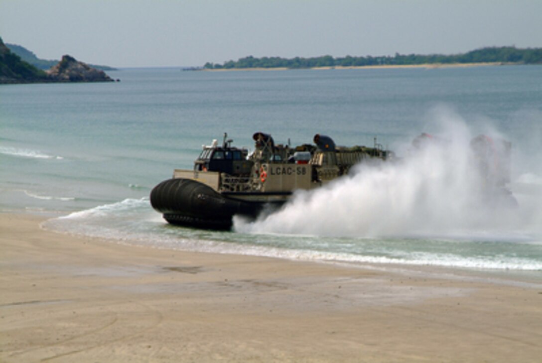 A landing craft air cushion lands on a beach in Hat Yao, Thailand, while participating in Exercise Cobra Gold 2006 on May 15, 2006. Cobra Gold is an annual training exercise involving the United States, Thailand, Japan, Singapore, and Indonesia. 
