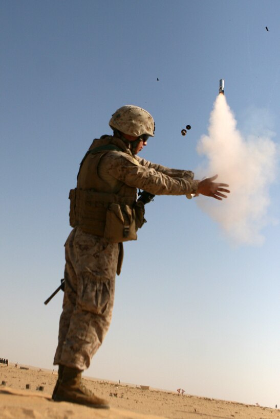 Lance Cpl. Jeffrey A. Toledo, a Team Leader with 2nd Platoon, Golf Company fires an M-127  A1 white star illumination parachute in the wide-open Kuwaiti desert during training outside Camp Buehring, Kuwait.  ::r::::n::   Golf Company took advantage of the wide-open desert of Northern Kuwait to conduct training with grenades, close quarters combat and rocket fire.::r::::n::   The Camp Pendleton, Calif. based 15th MEU is comprised of approximately 2,200 Marines and Sailors and is a forward deployed force of readiness capable of conducting numerous operations, such as Non-Combatant Evacuation Operations, Humanitarian Assistance Operations and a wide range of amphibious missions. ::r::::n::   The 15th MEU is currently conducting sustainment training at Camp Buehring, Kuwait. (Official USMC photo by Lance Cpl. Timothy T. Parish) (Released)::r::::n::::r::::n::