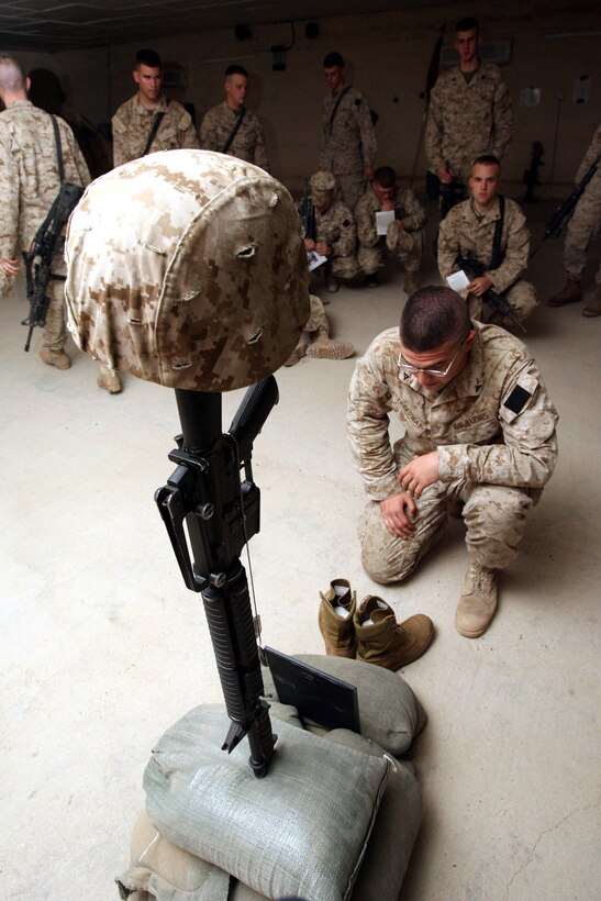 On 17 May 2006, Lance Corporal Paul A. Treadway, a 21-year-old infantryman from Webster, West Virginia with  Company K, 3rd Battalion, 8th Marine Regiment morns underneath the memorial Lance Corporal Richard Z. James who was killed in Ramadi, Iraq, during a combat operation.  3/8 is currently deployed with I MEF (FWD) in support of Operation Iraqi Freedom in the Al Anbar province of Iraq (MNF-W) to develop the Iraqi Security Forces, facilitate the development of official rule of law through demographic government reforms, and continue the development of a market based economy centered on Iraqi reconstruction.