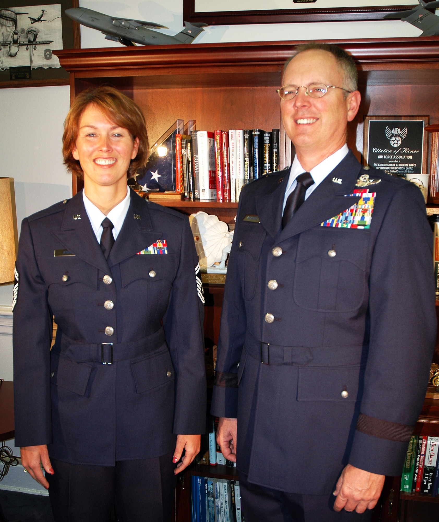 Brig. Gen. Robert Allardice and Senior Master Sgt. Dana Athnos show off prototypes of the Hap Arnold heritage coat in the Pentagon on Monday, May 15, 2006. General Allardice is director of Airmen development and sustainment and Sergeant Athnos is a member of the Air Force uniform board. (U.S. Air Force photo/Staff Sgt. C. Todd Lopez)