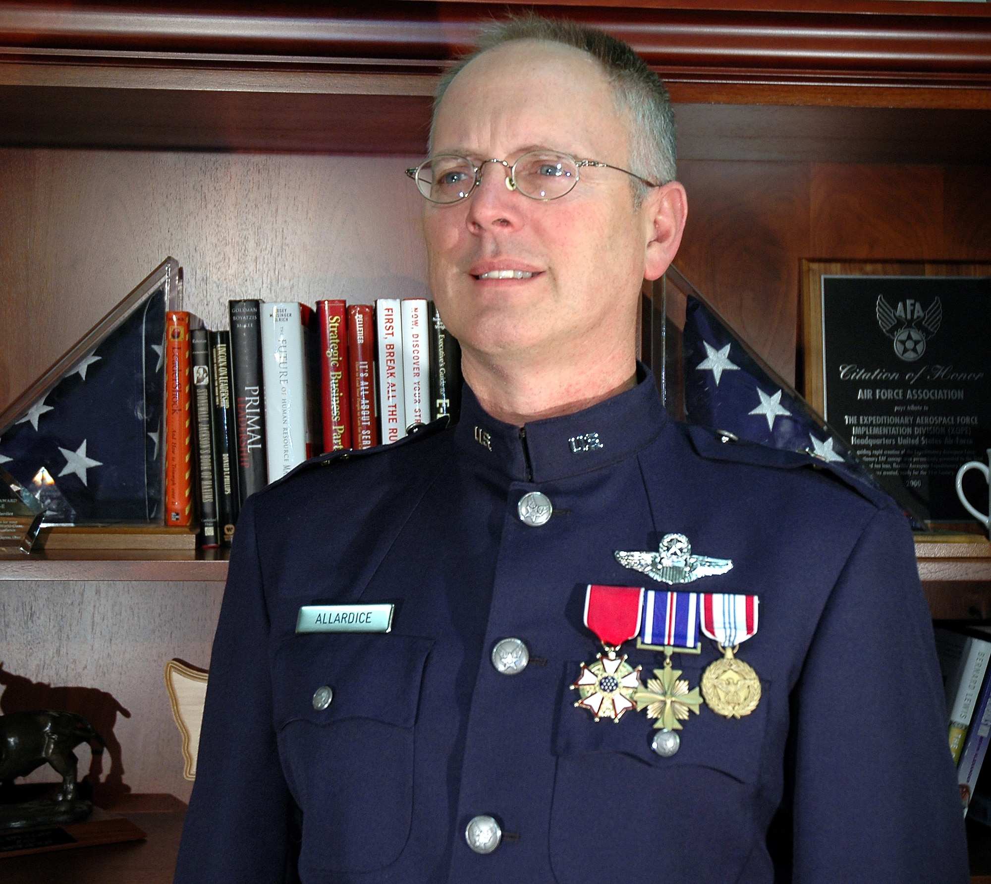 Brig. Gen. Robert Allardice shows off a prototype of the Billy Mitchell heritage coat in the Pentagon on Monday, May 15, 2006.  General Allardice is director of Airmen development and sustainment.  (U.S. Air Force photo/Staff Sgt. C. Todd Lopez)