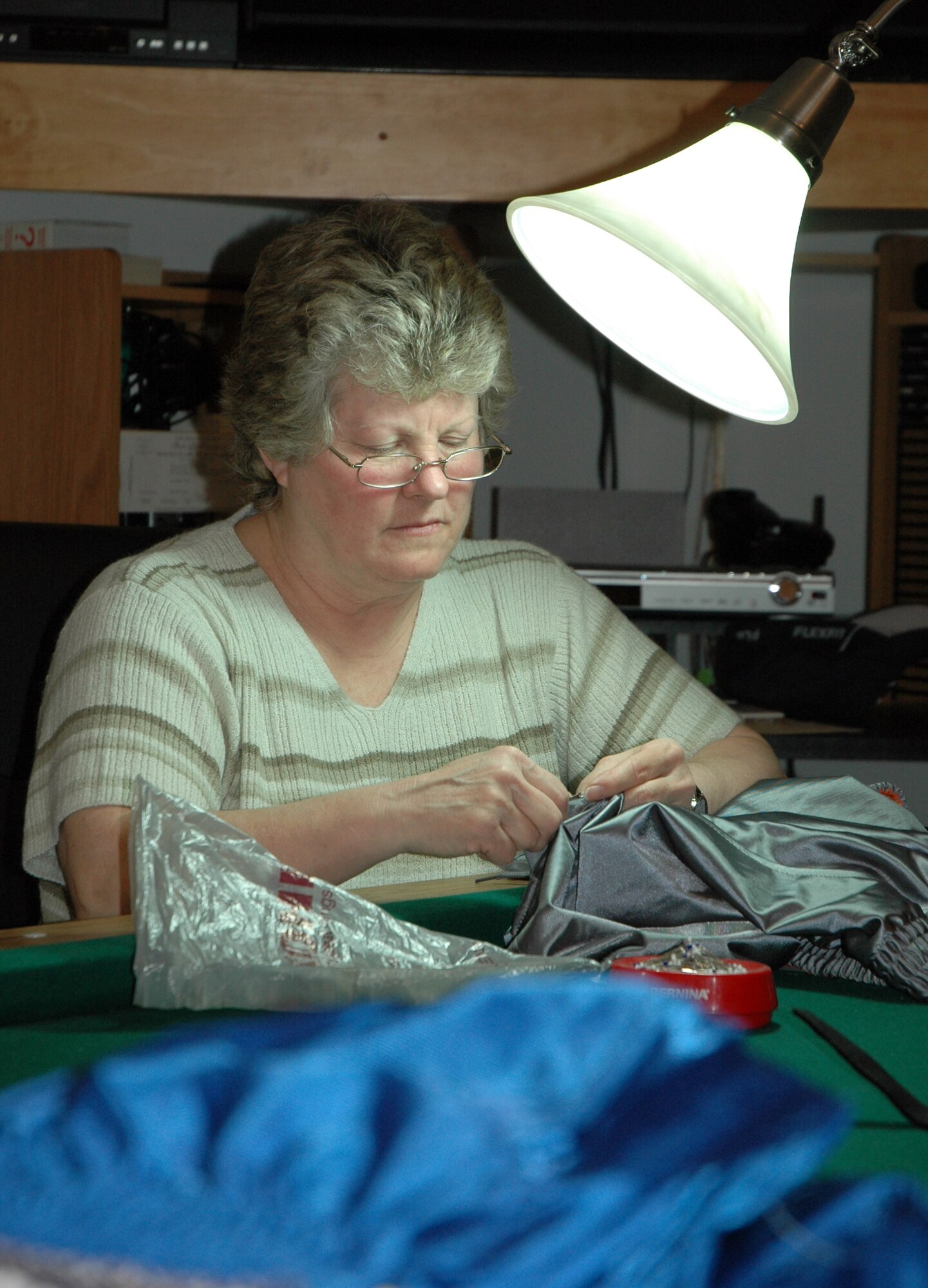 Wendy Schilling, 512th Airlift Wing Spouses Group member and wife of Retired Chief Master Sgt. Jim Schilling, formerly with the 512th Equipment Maintenance Squadron at Dover Air Force Base, was one of eight women who altered  40 shorts May 15 as part of the project Sew Much Comfort. The 512th Airlift Wing is a unit of the Air Force Reserve Command.

