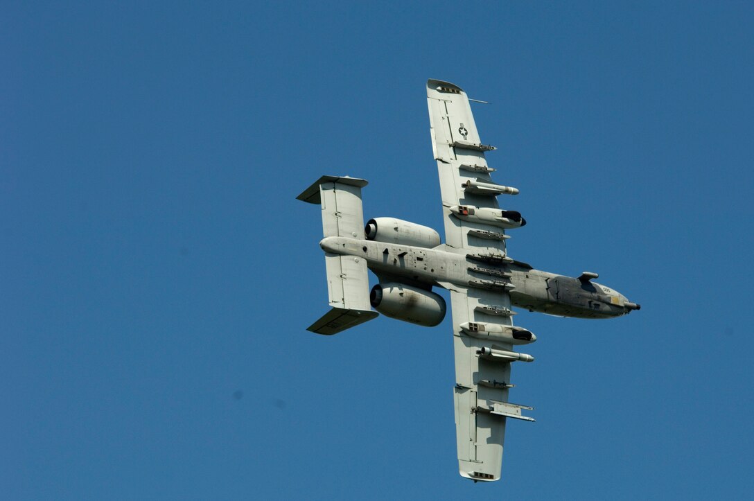An A-10 Thunderbolt II from Barksdale Air Force Base, La., approaches a target on May 16, 2006, called in by a joint terminal air controller during urban combat air support training.  The training took place in Deridder, La., where the 458th Combat Training Squadron from Fort Polk, La., has an agreement to allow flights over the city for more realistic urban conditions.  The controllers are from Detachment 1, 458th CTS.  (U.S. Air Force Photo/Master Sgt. Jack Braden)