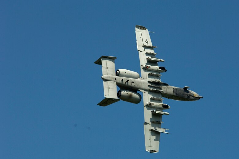 An A-10 Thunderbolt II from Barksdale Air Force Base, La., approaches a target on May 16, 2006, called in by a joint terminal air controller during urban combat air support training.  The training took place in Deridder, La., where the 458th Combat Training Squadron from Fort Polk, La., has an agreement to allow flights over the city for more realistic urban conditions.  The controllers are from Detachment 1, 458th CTS.  (U.S. Air Force Photo/Master Sgt. Jack Braden)