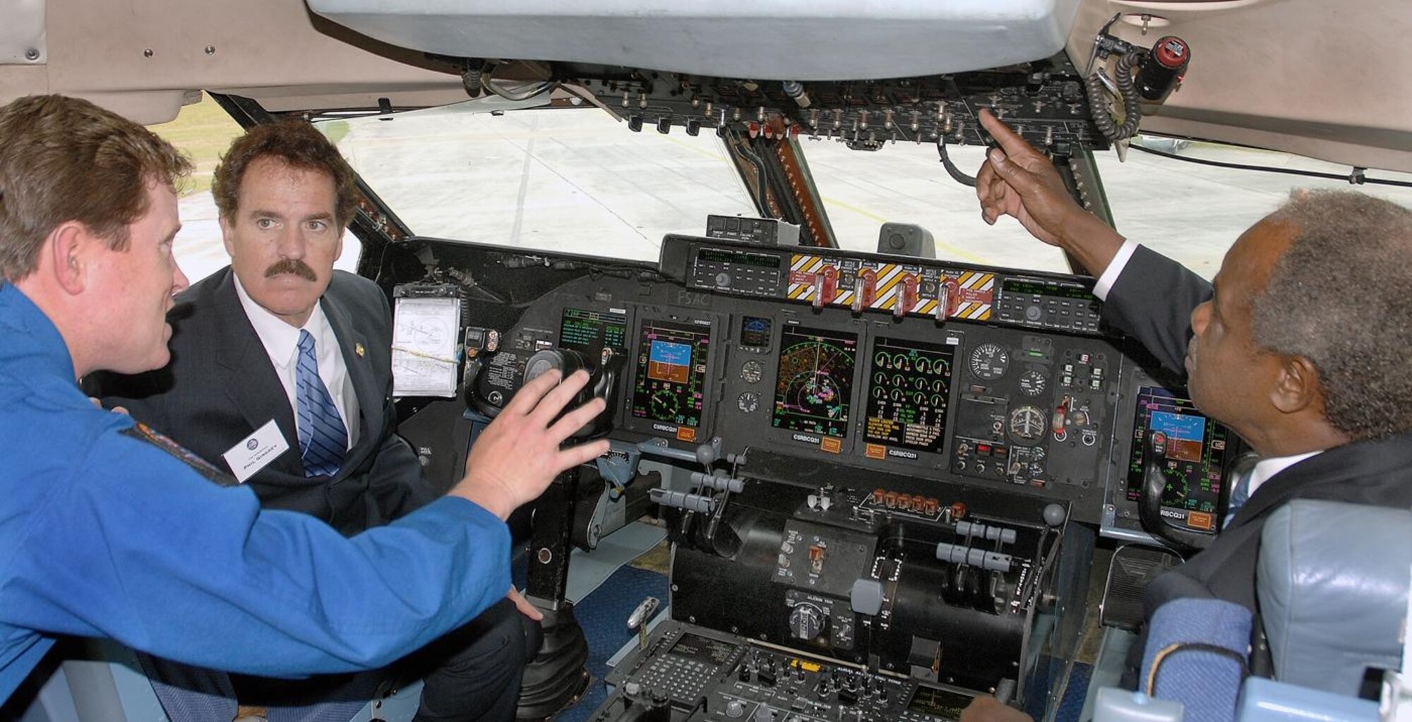 Attendees to the recent C-5M Roll-out ceremony at the Lockheed Martin facility in Marietta, Ga., receive a hands-on experience of the C-5M’s modern cockpit. (Courtesy photo)