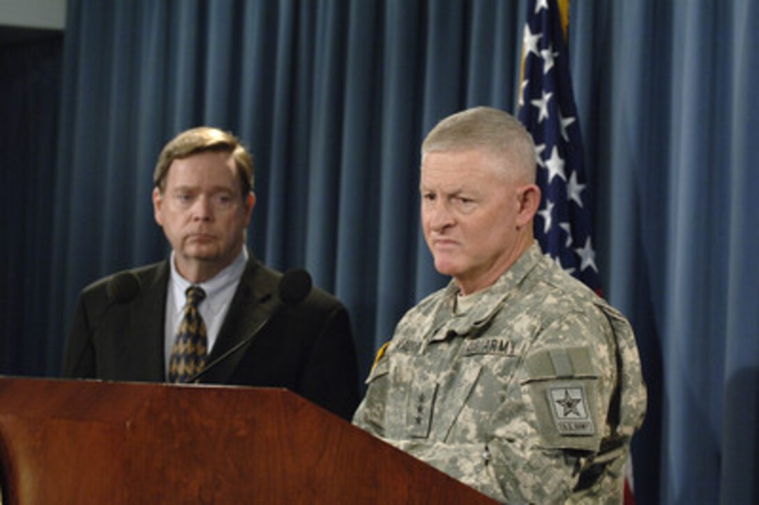 Army National Guard Director Lt. Gen. Clyde A. Vaughn (right) and Assistant Secretary of Defense for Homeland Defense Paul McHale (left) brief reporters in the Pentagon on the involvement of the military in border security operations on May 18, 2006. 